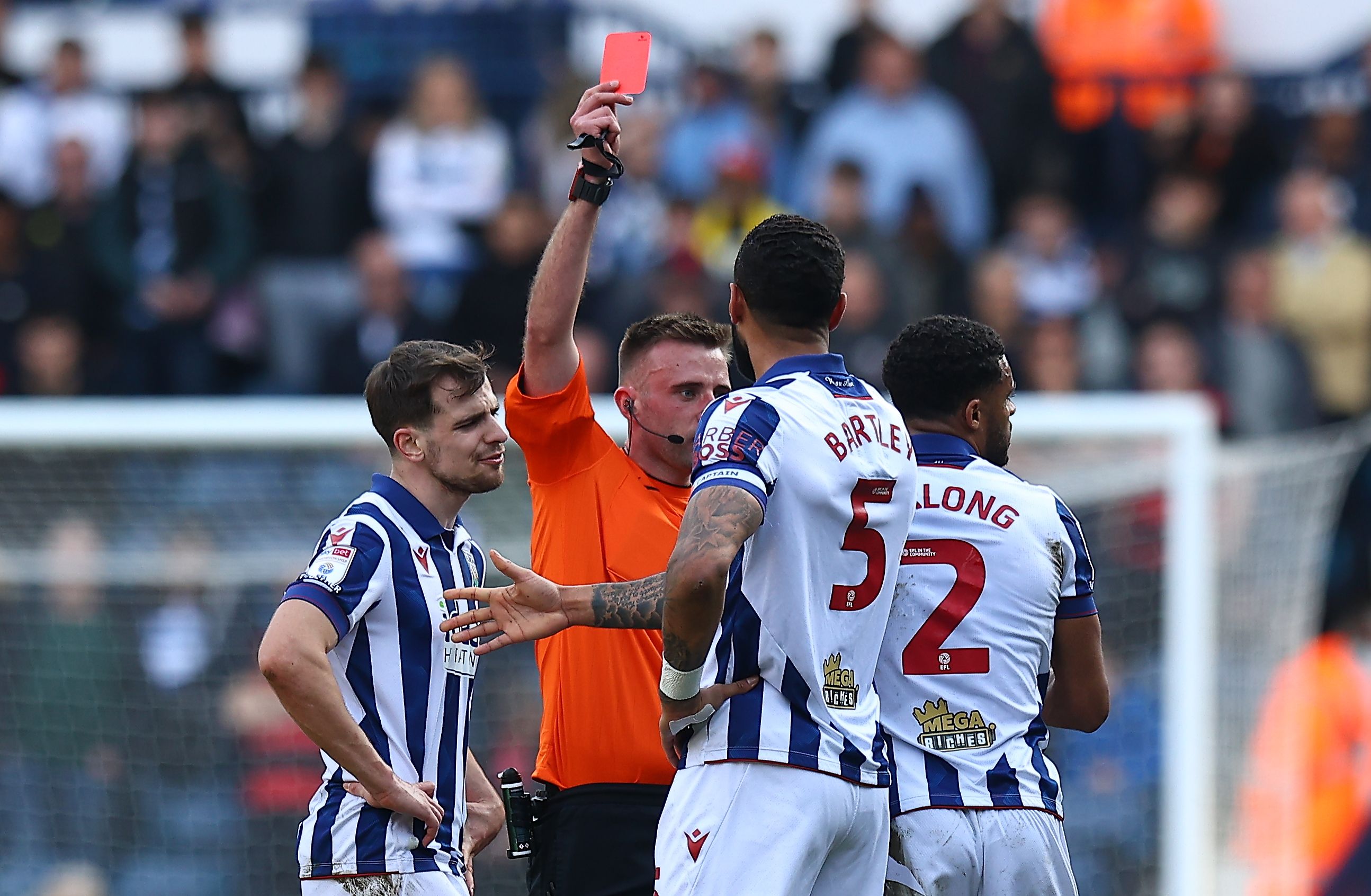 Darnell Furlong is shown a red card against QPR 