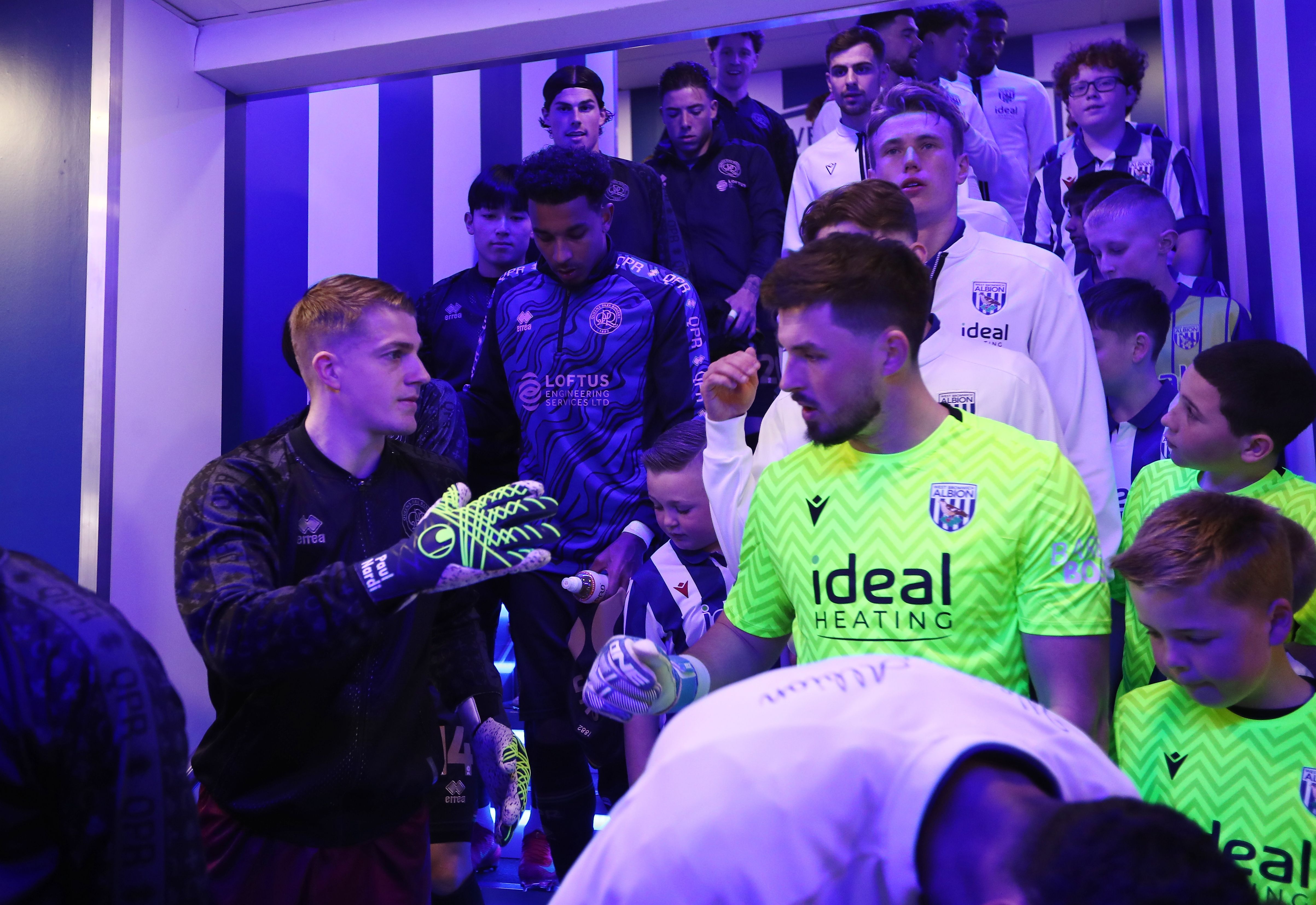 QPR and WBA line up in the tunnel ahead of the game at The Hawthorns