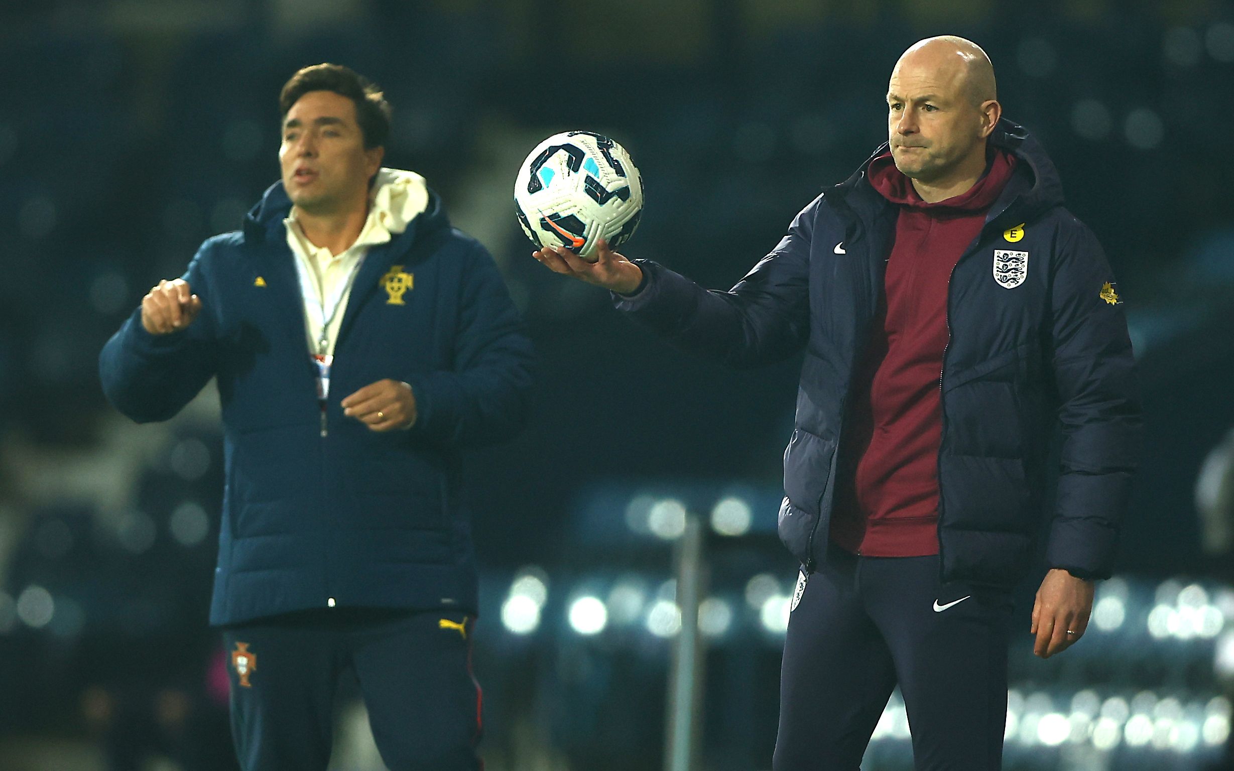 England U21 boss Lee Carsley on the side of the pitch at The Hawthorns holding a ball