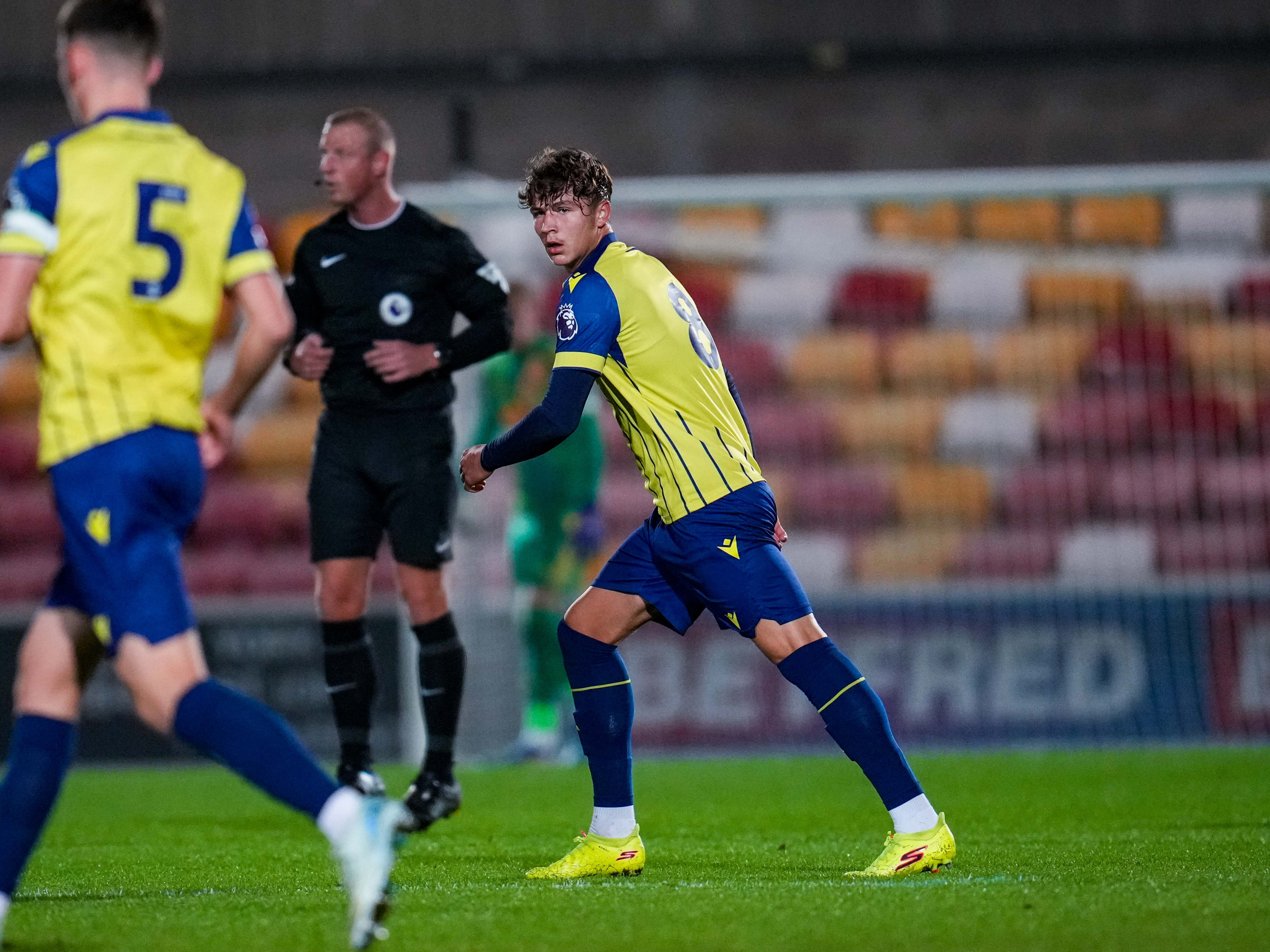 A photo of Albion youngster Cole Deeming in the yellow 2024/25 away kit