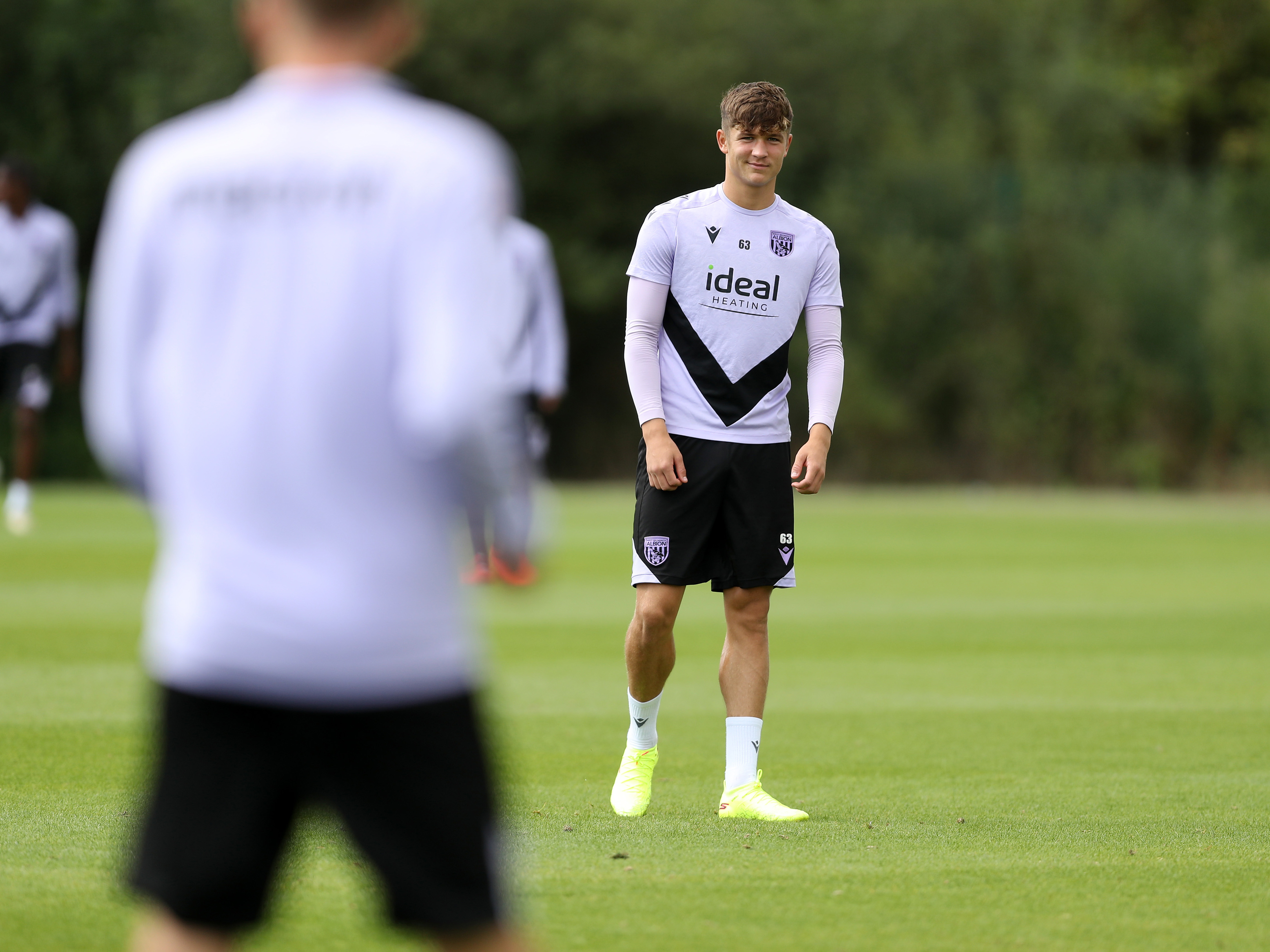 A photo of Albion youngster Cole Deeming in the 2024/25 purple training kit