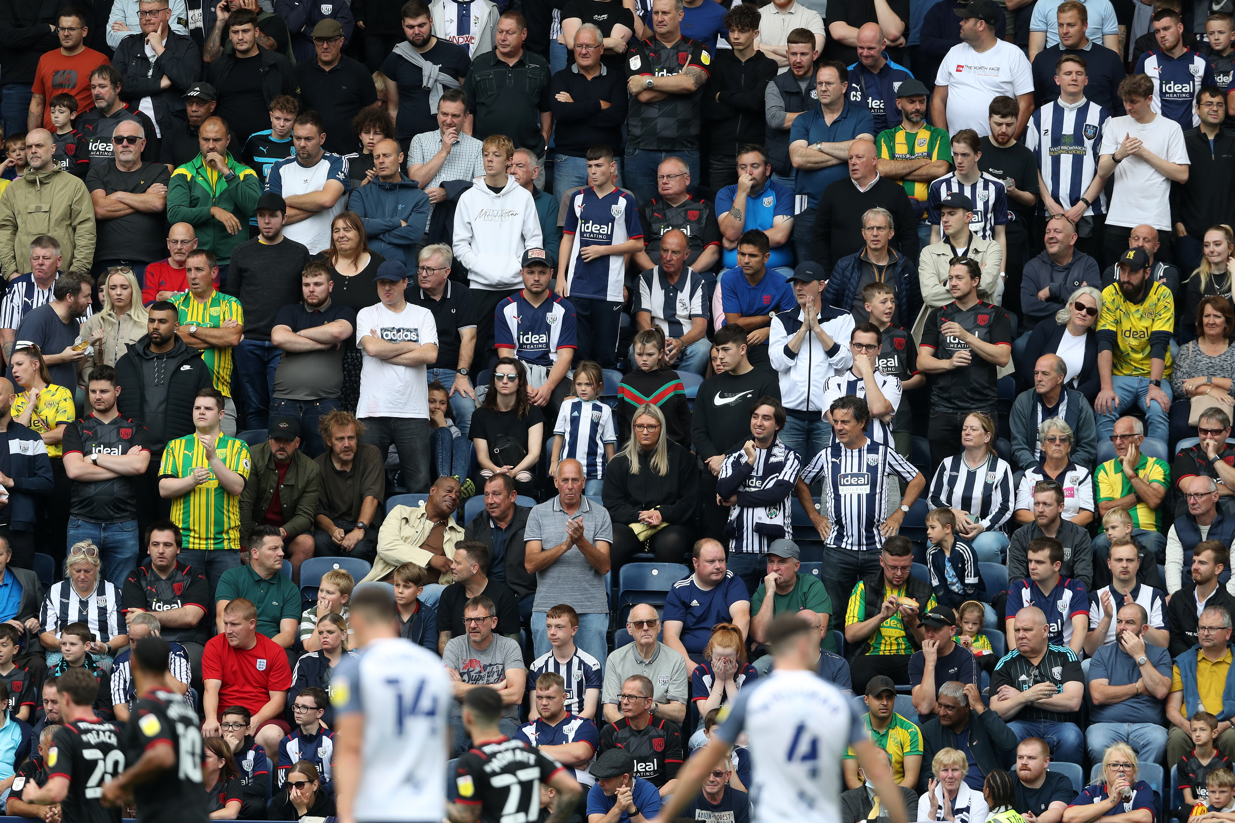 A general view of Albion fans in Albion shirts watching a game