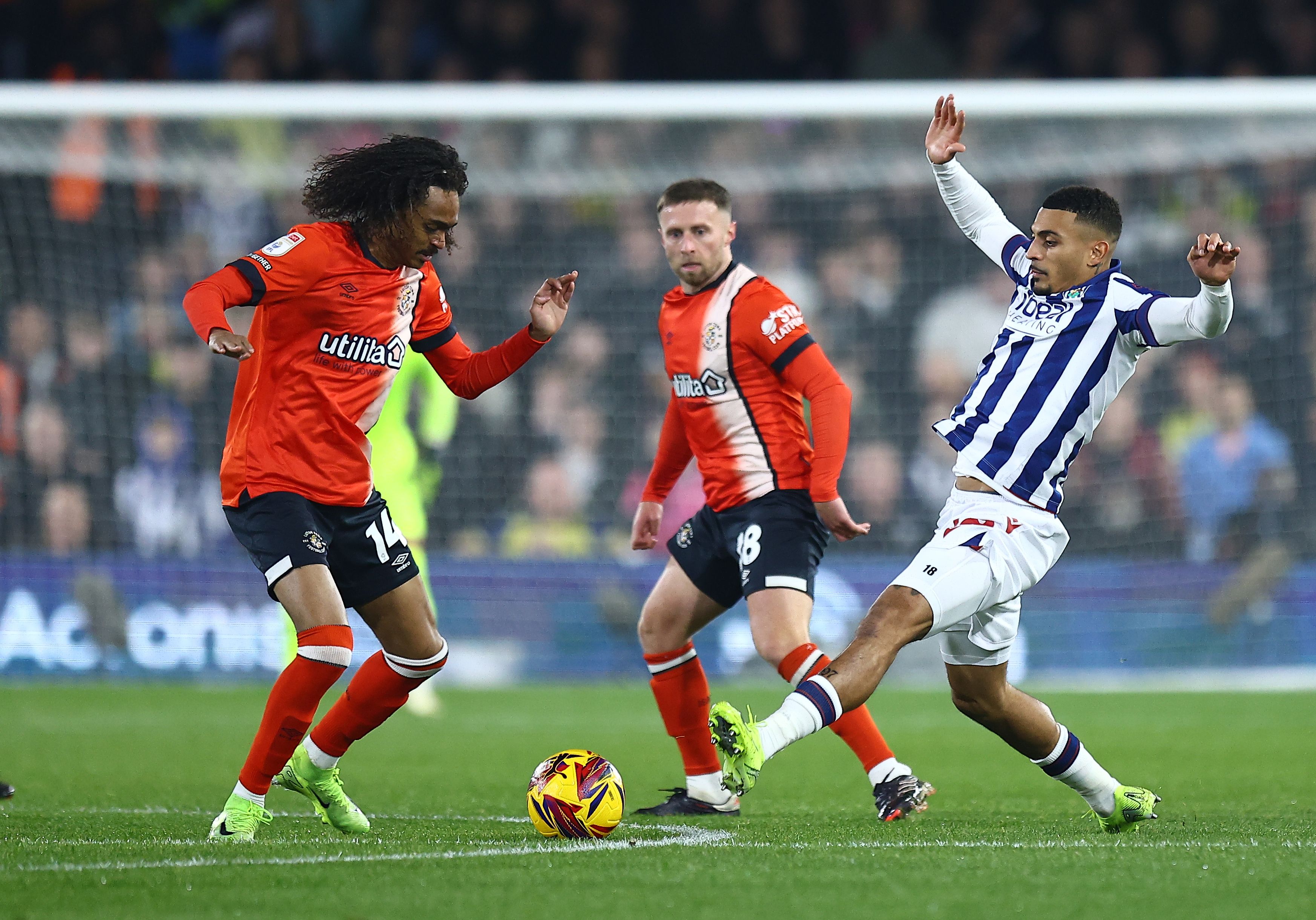 Karlan Grant in action against Luton in the home kit in November 2024