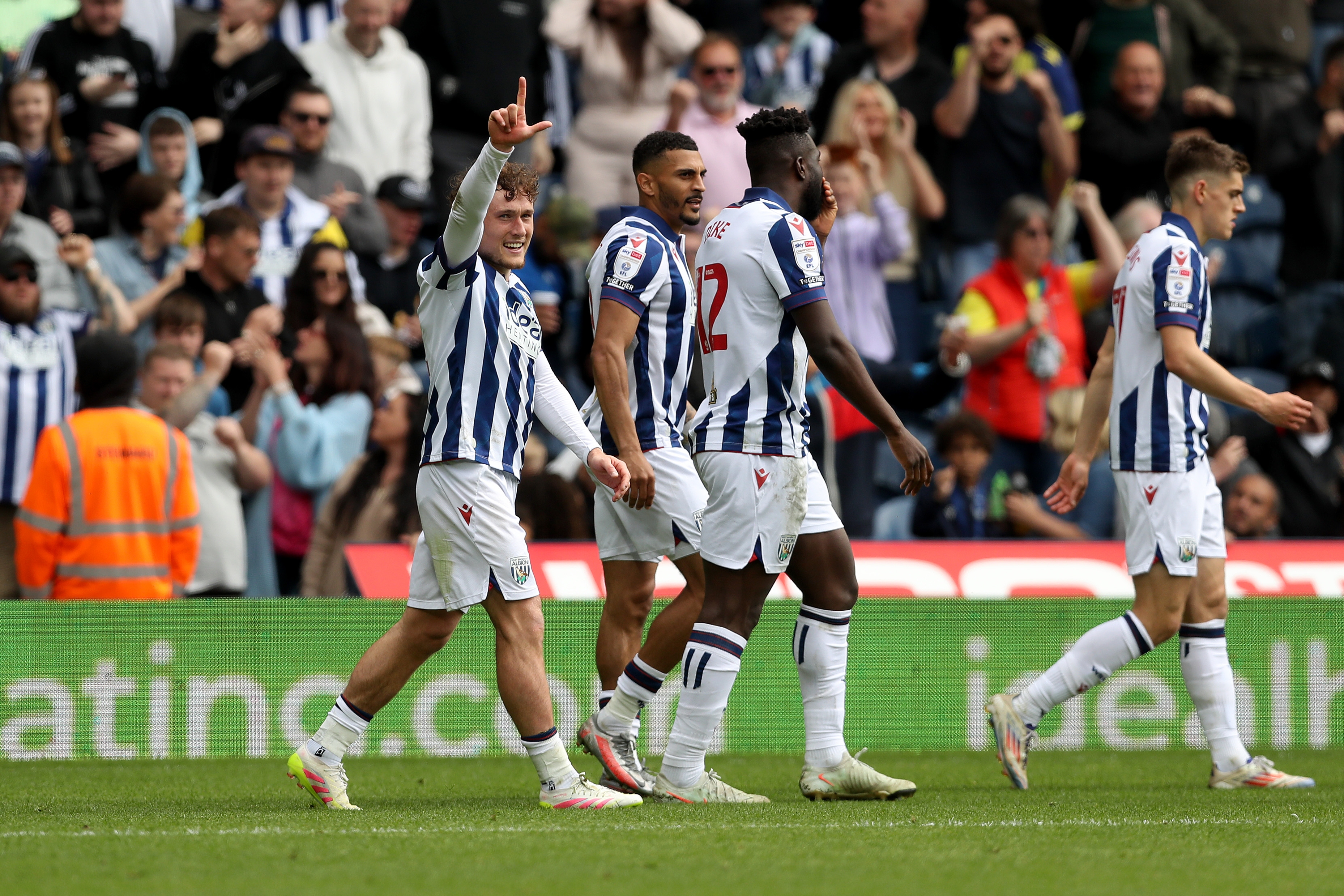 Callum Styles celebrates scoring against Luton Town with team-mates