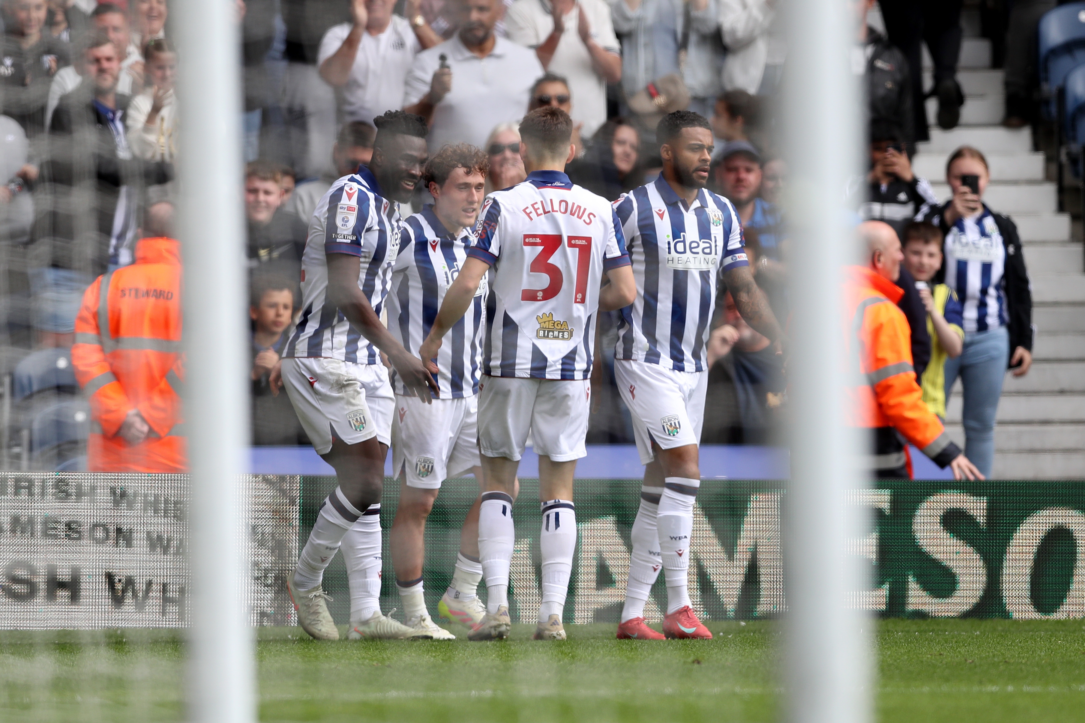 Callum Styles celebrates scoring against Luton Town with team-mates