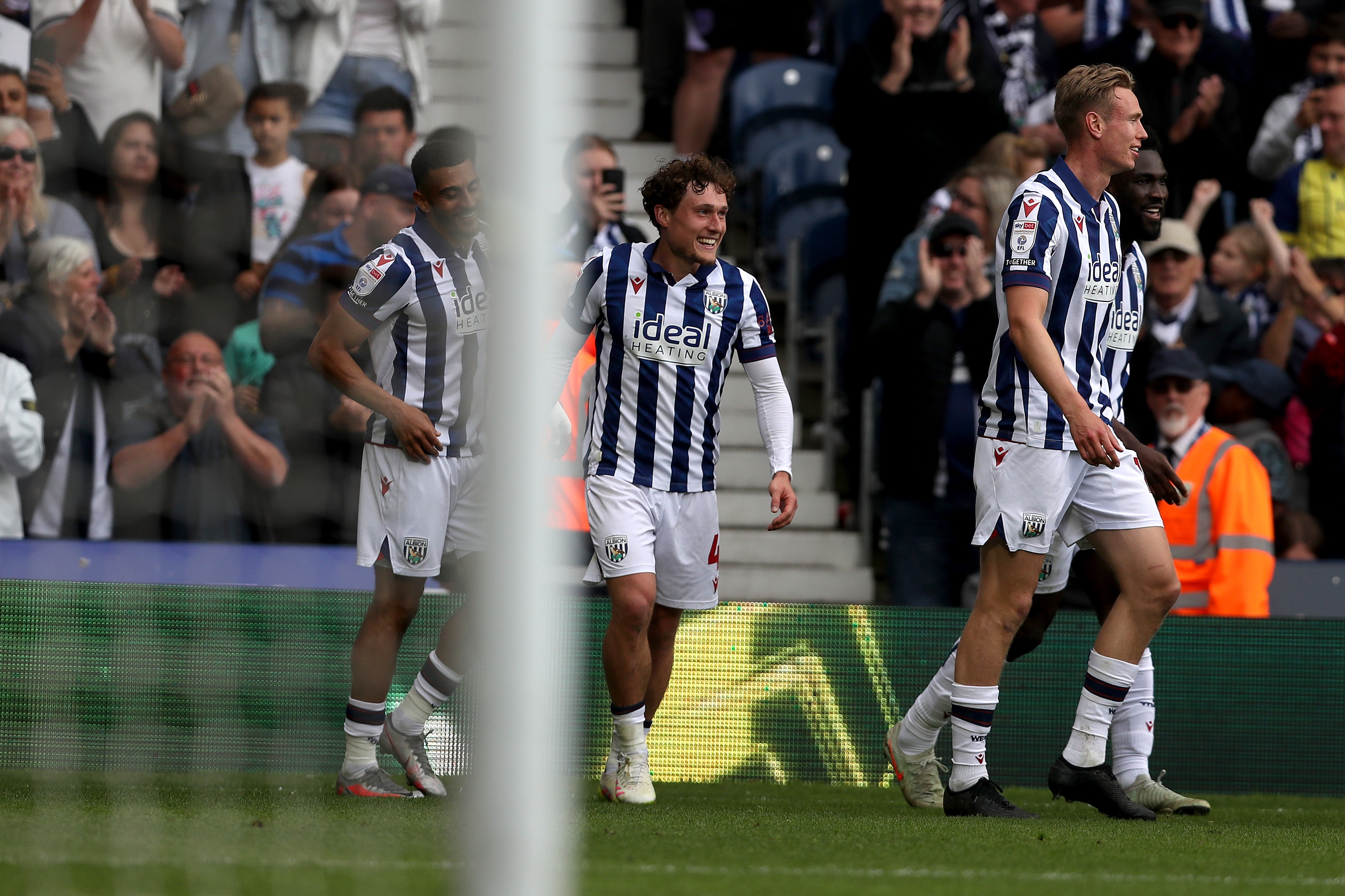 Callum Styles celebrates scoring against Luton Town with team-mates