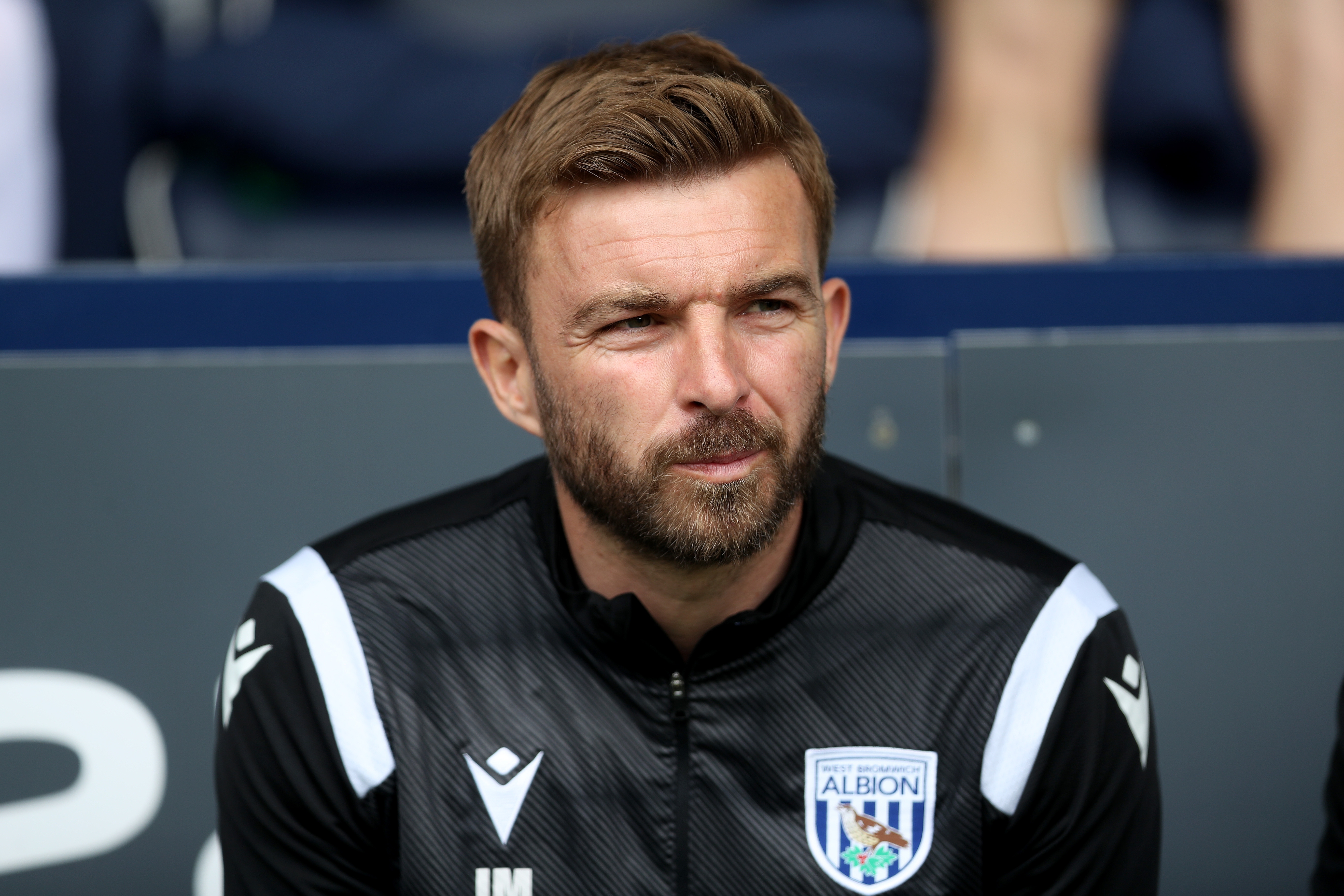 James Morrison sat looking out onto the pitch at The Hawthorns