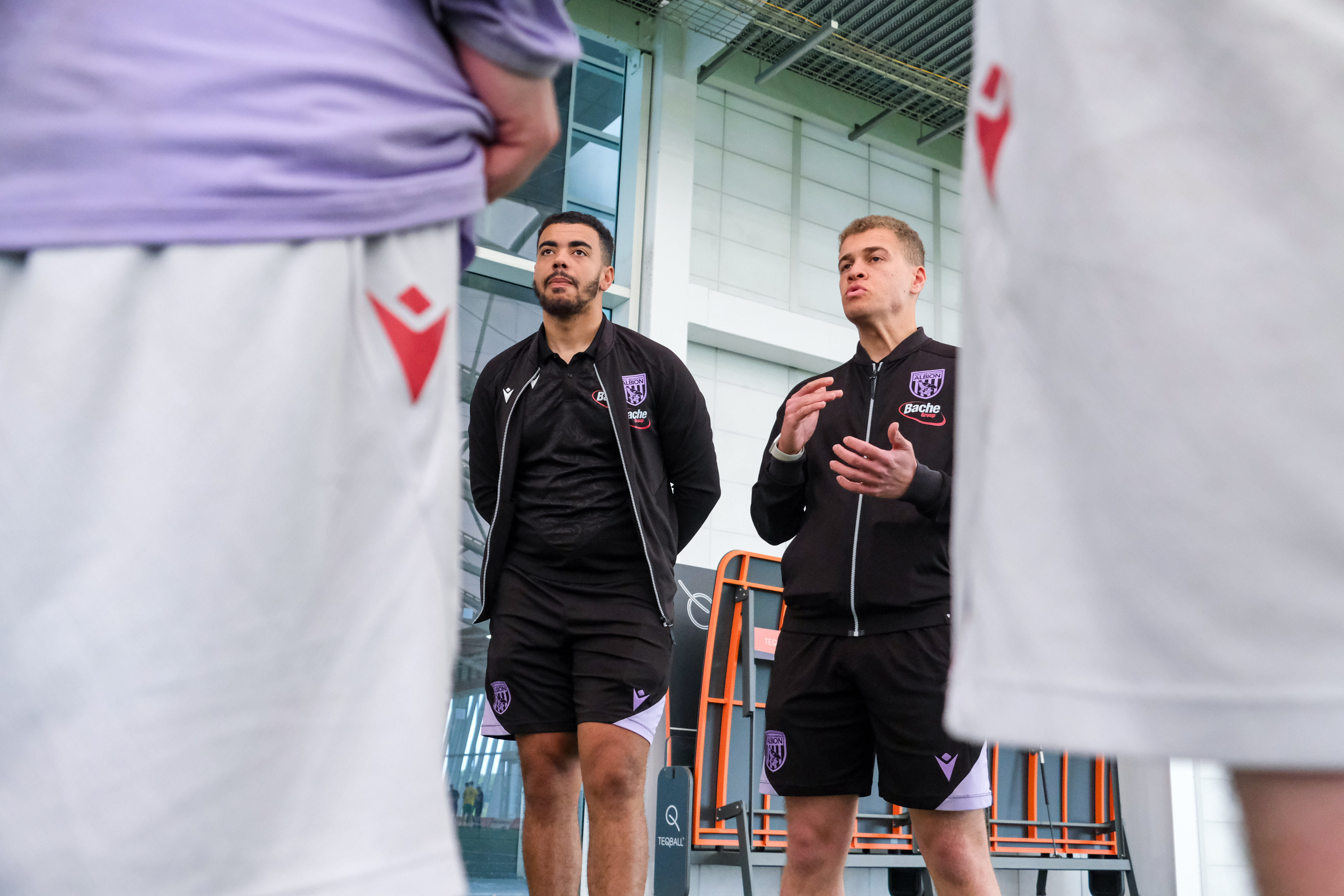 Jordan (L) and Conor (R) deliver a team talk.