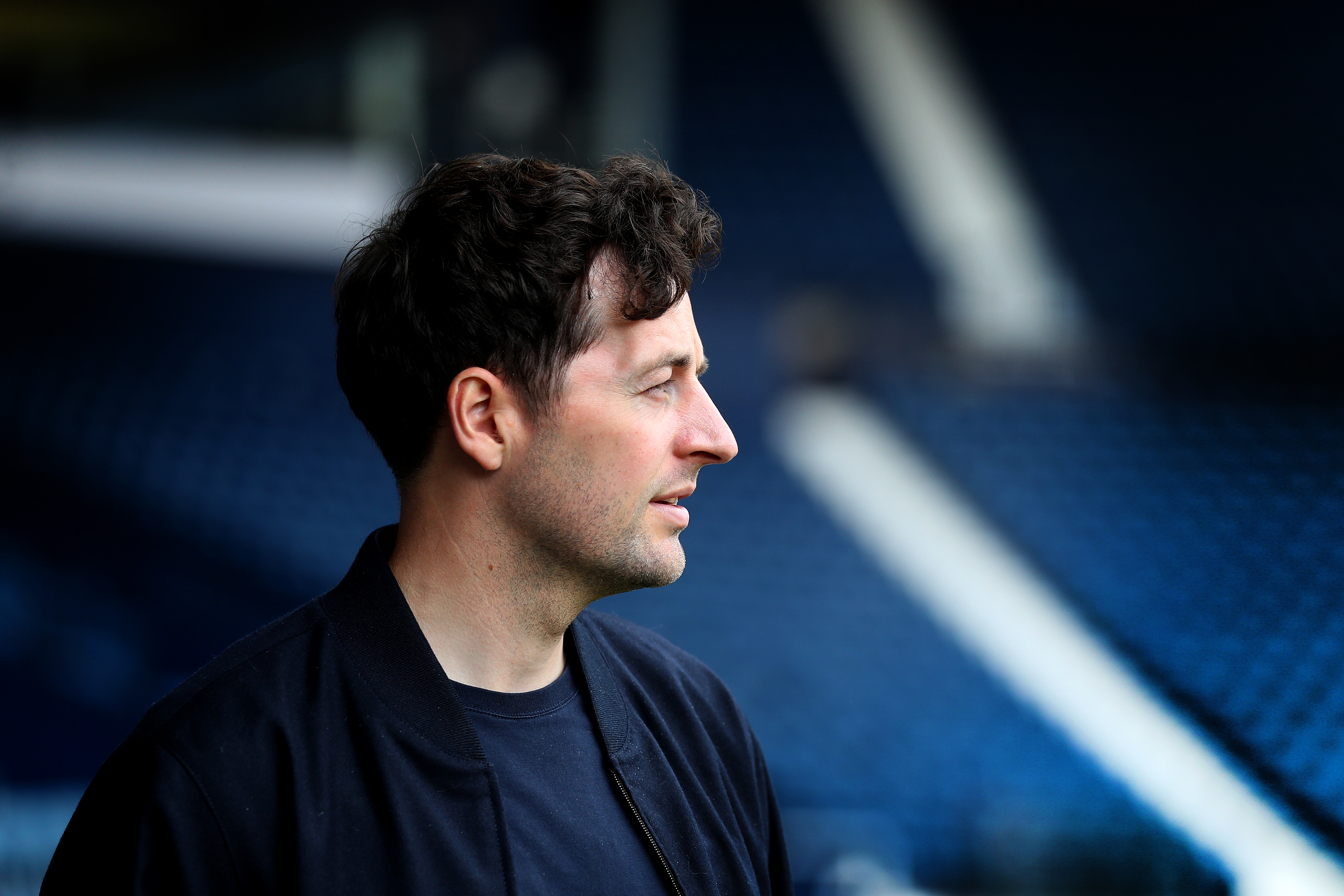 Ryan Mason looking out at the pitch at The Hawthorns