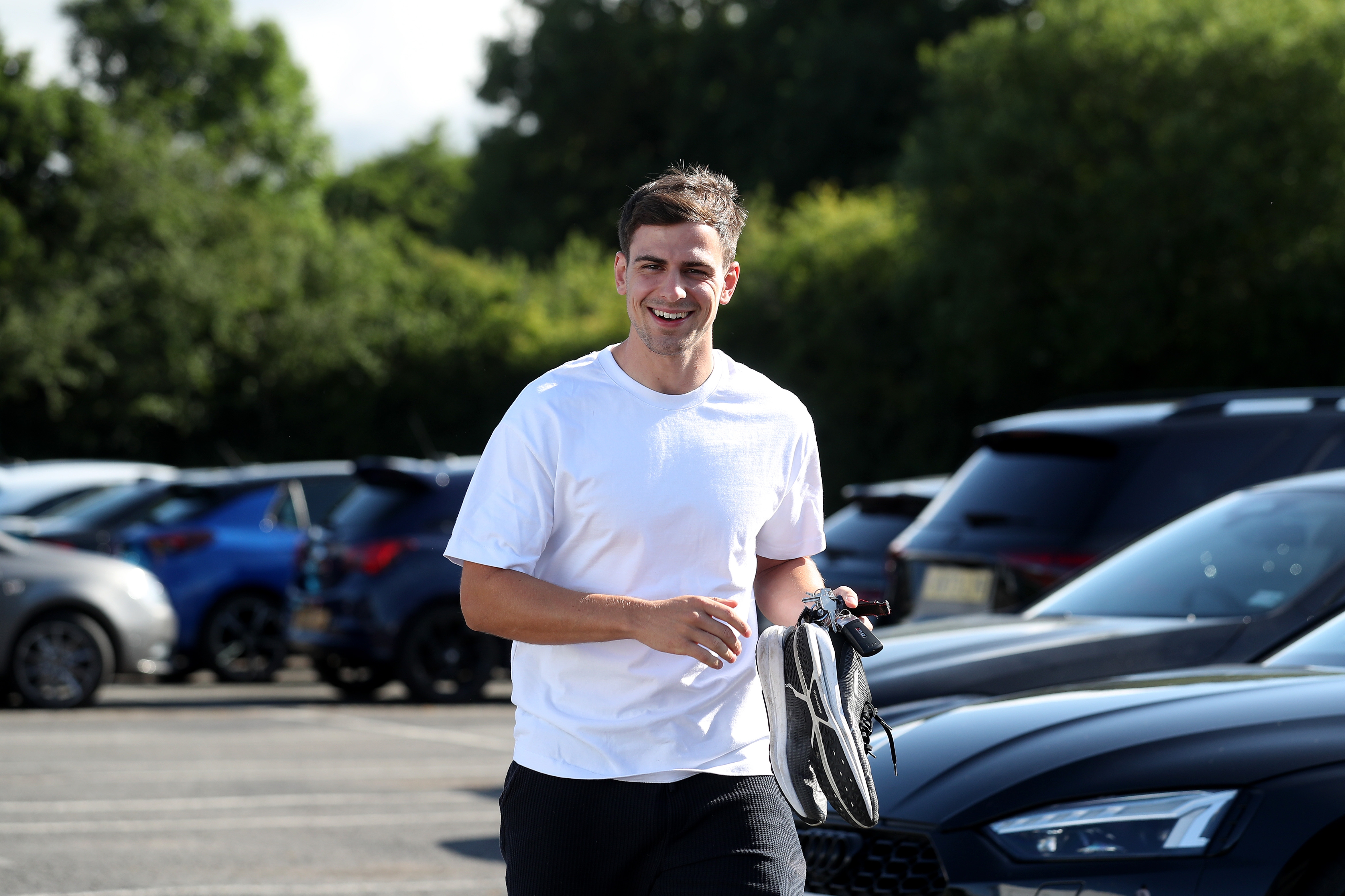 Jayson Molumby arriving at the training ground for the first day of pre-season