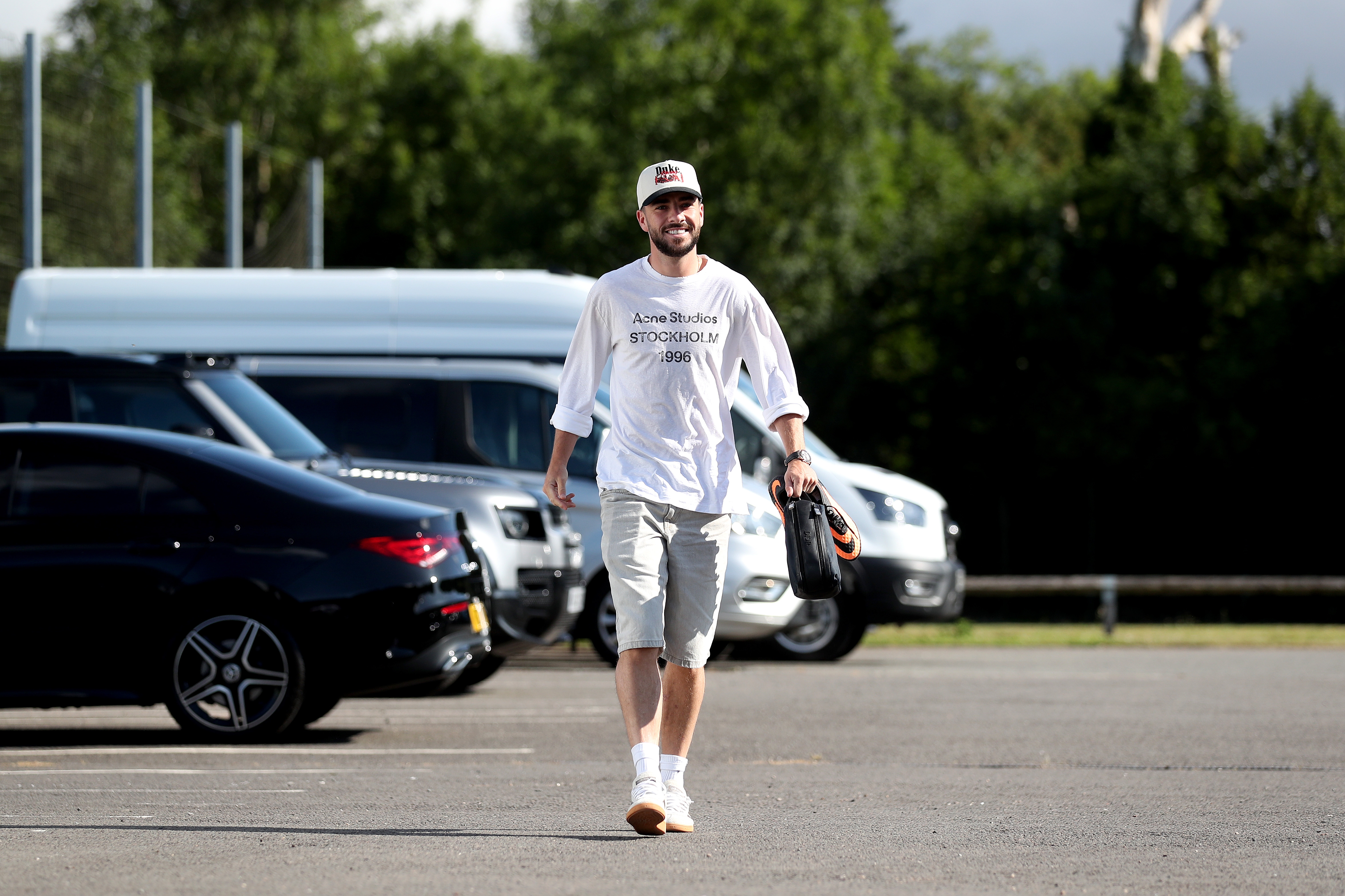 Mikey Johnston arriving at the training ground for the first day of pre-season