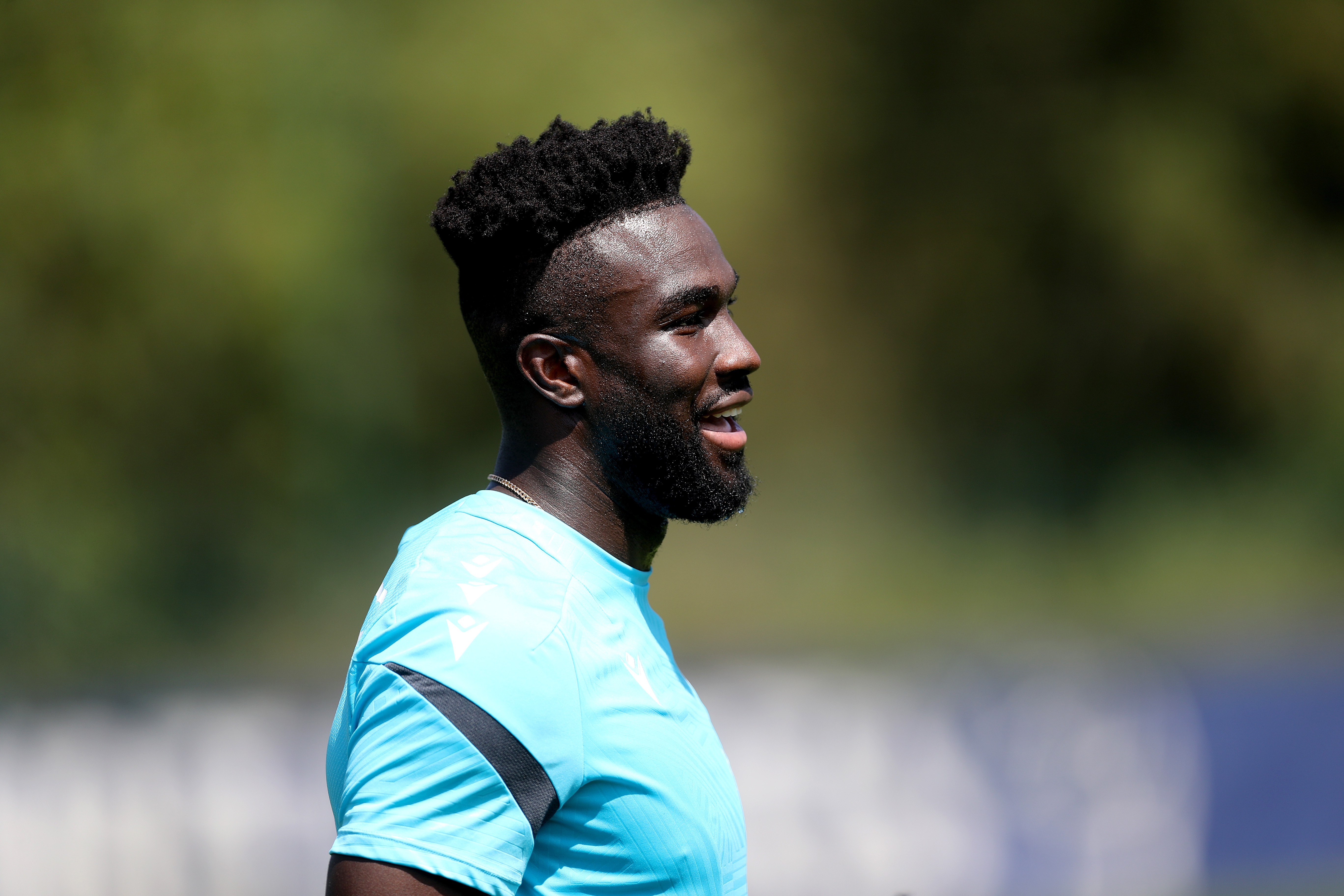 A close-up of Daryl Dike smiling during a training session
