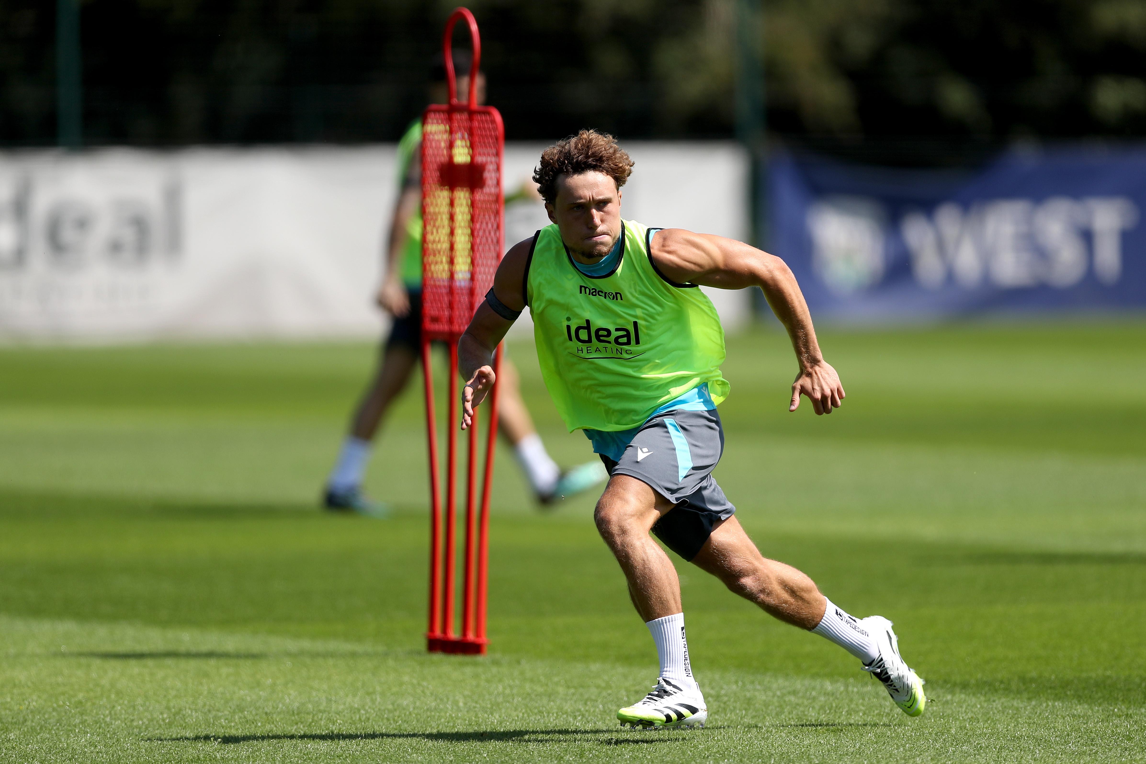 Callum Styles running forward during a training session
