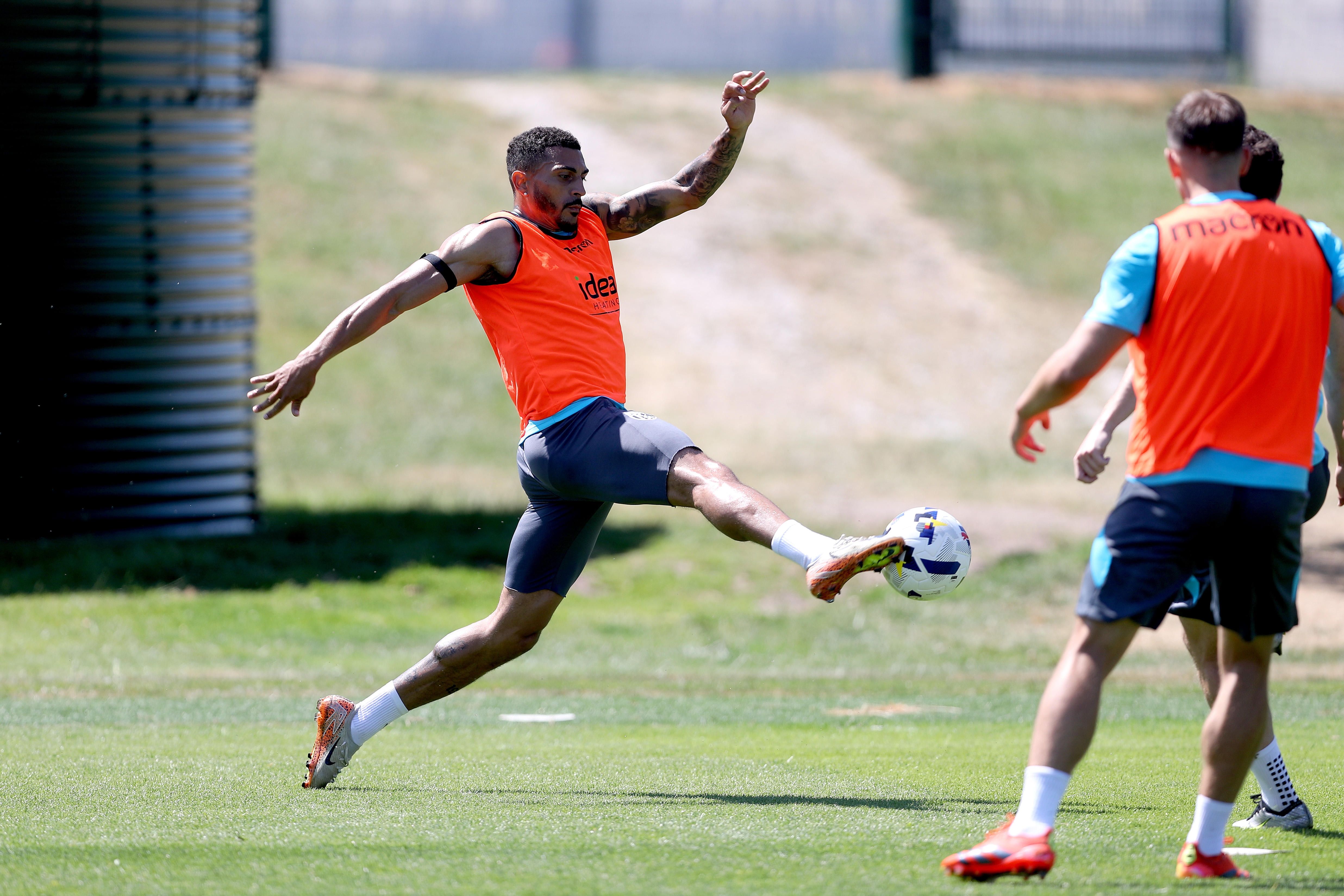Karlan Grant stretching for the ball during a training session