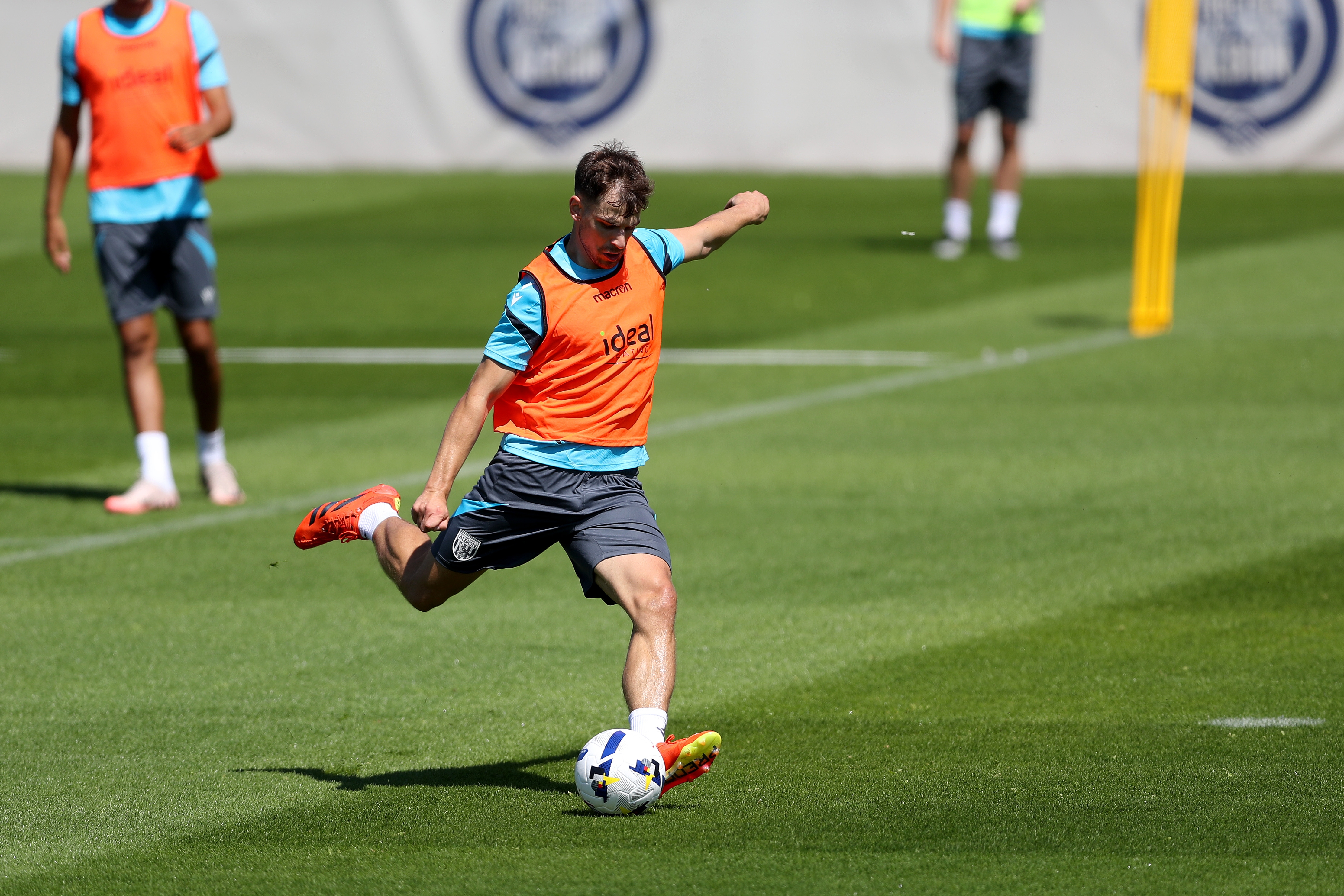 Jayson Molumby striking the ball during a training session