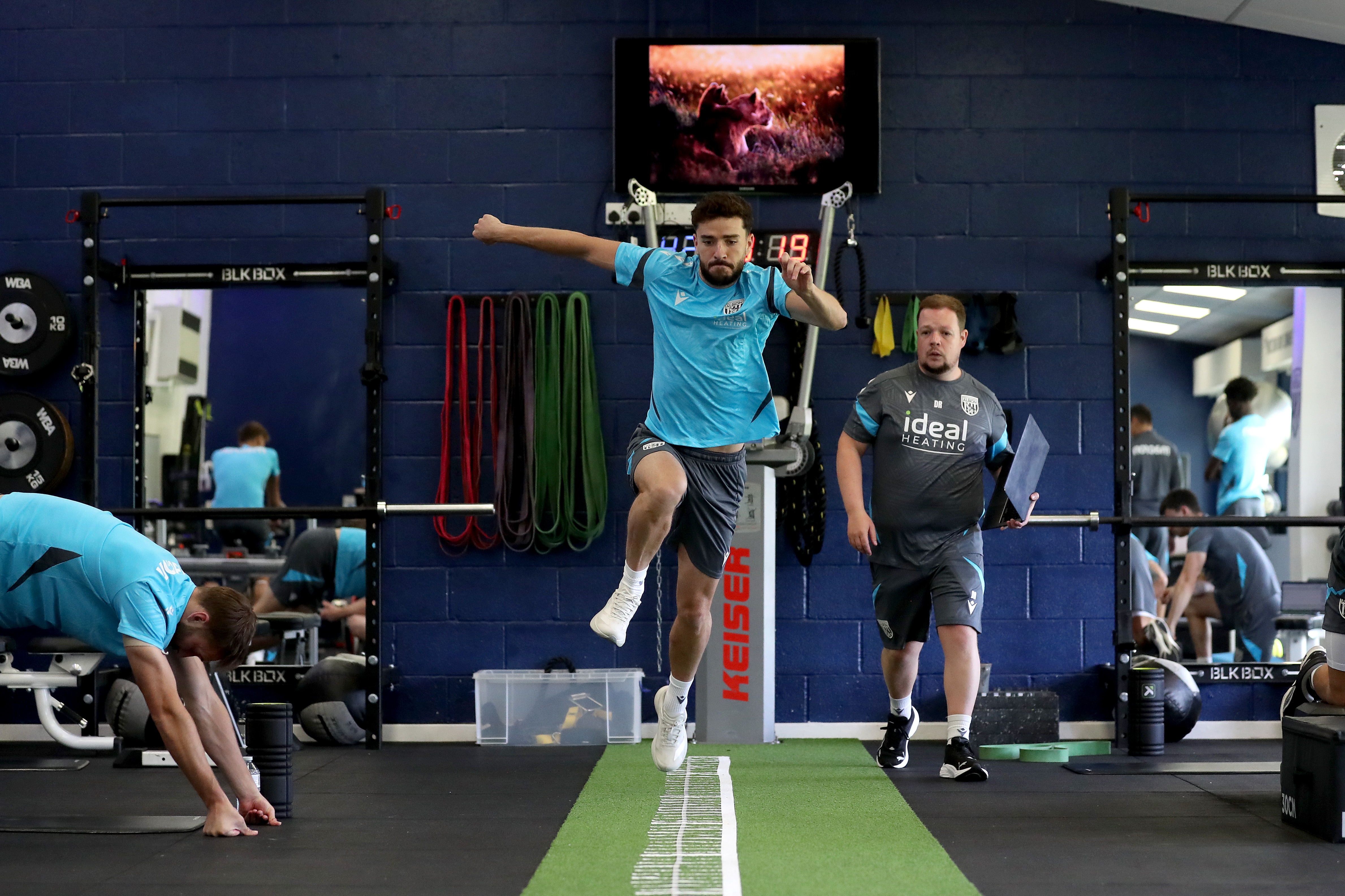 Mikey Johnston carrying out a jumping test in the gym