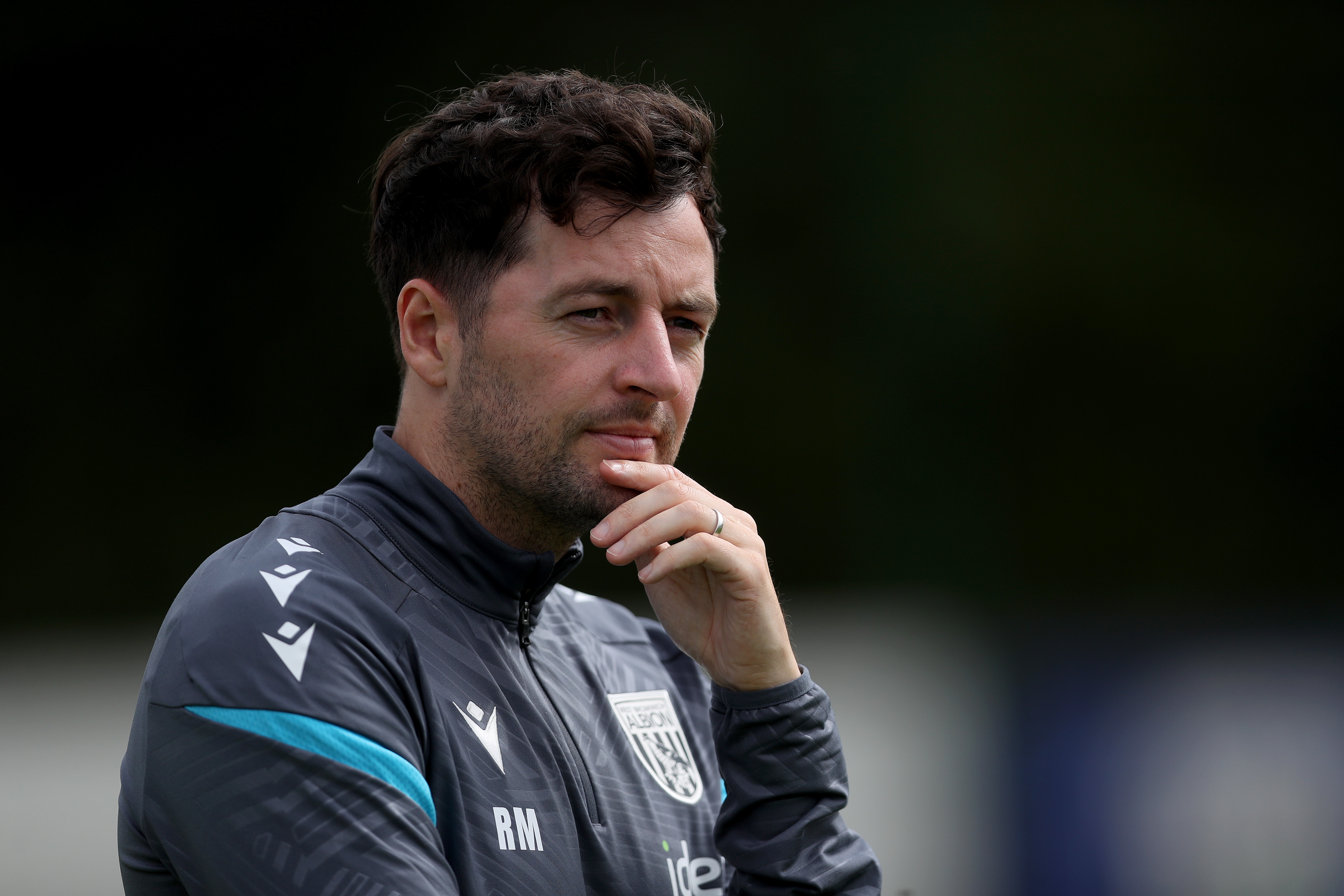 Ryan Mason watching training