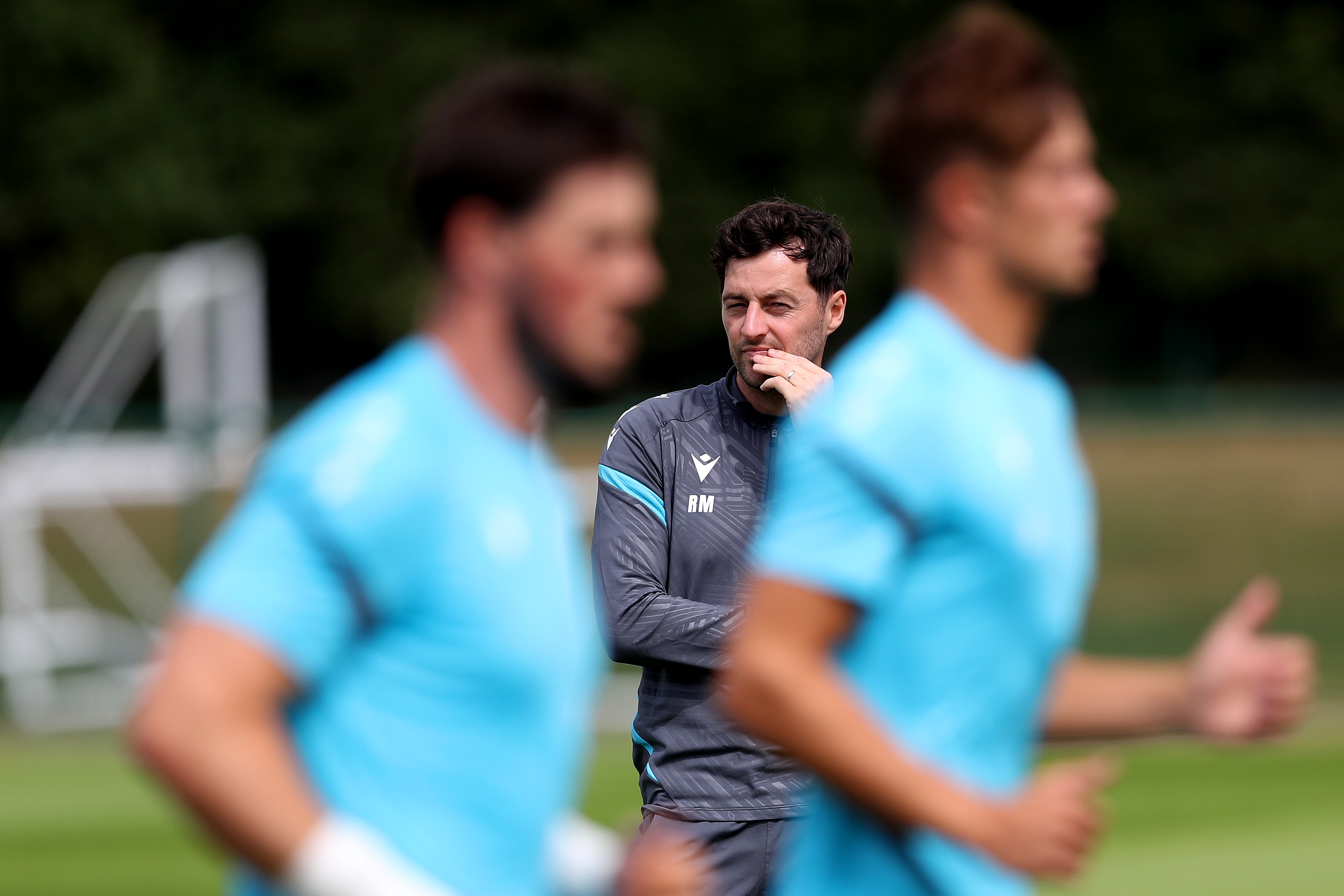 Ryan Mason watching training