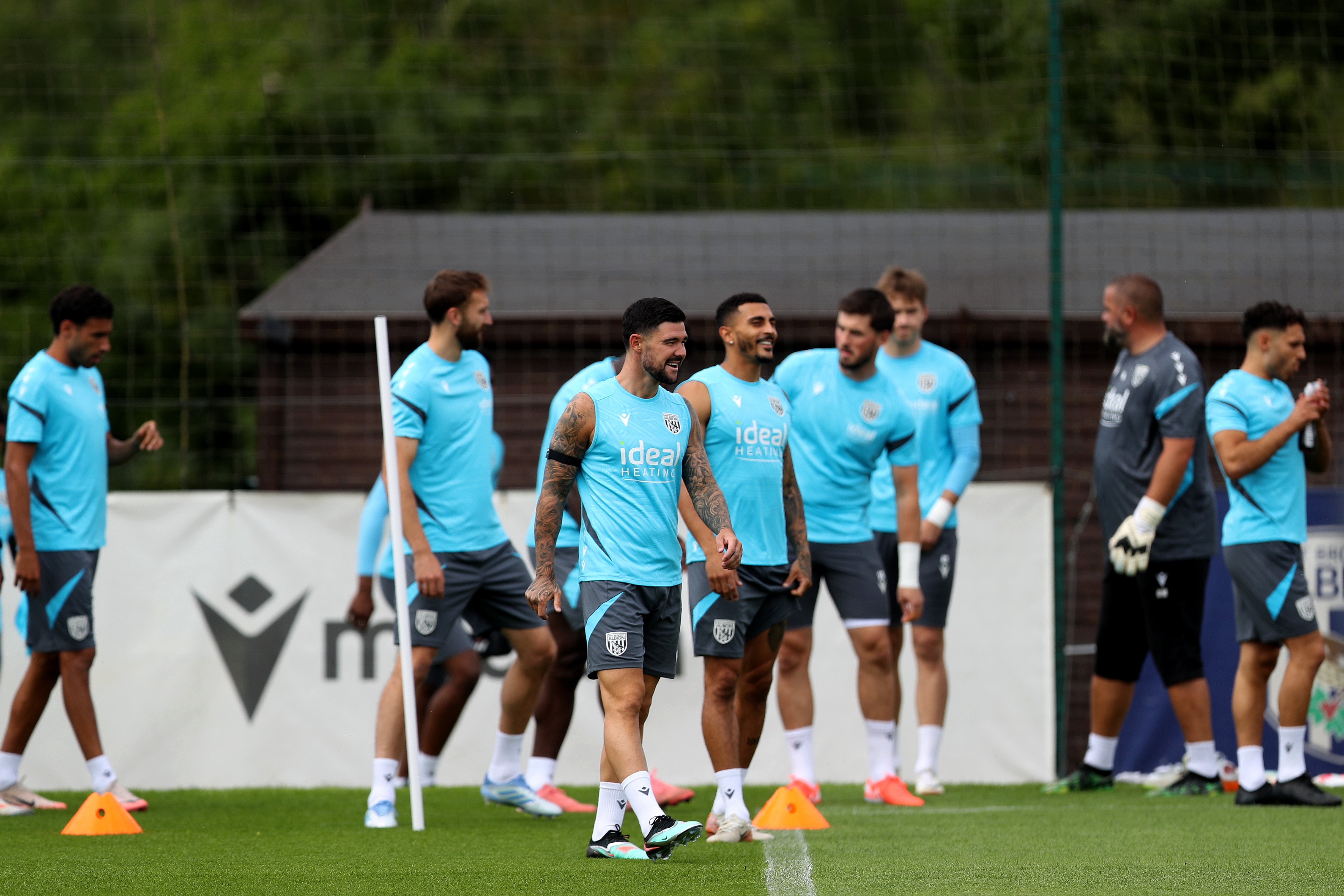 Several Albion players getting ready to start a training session