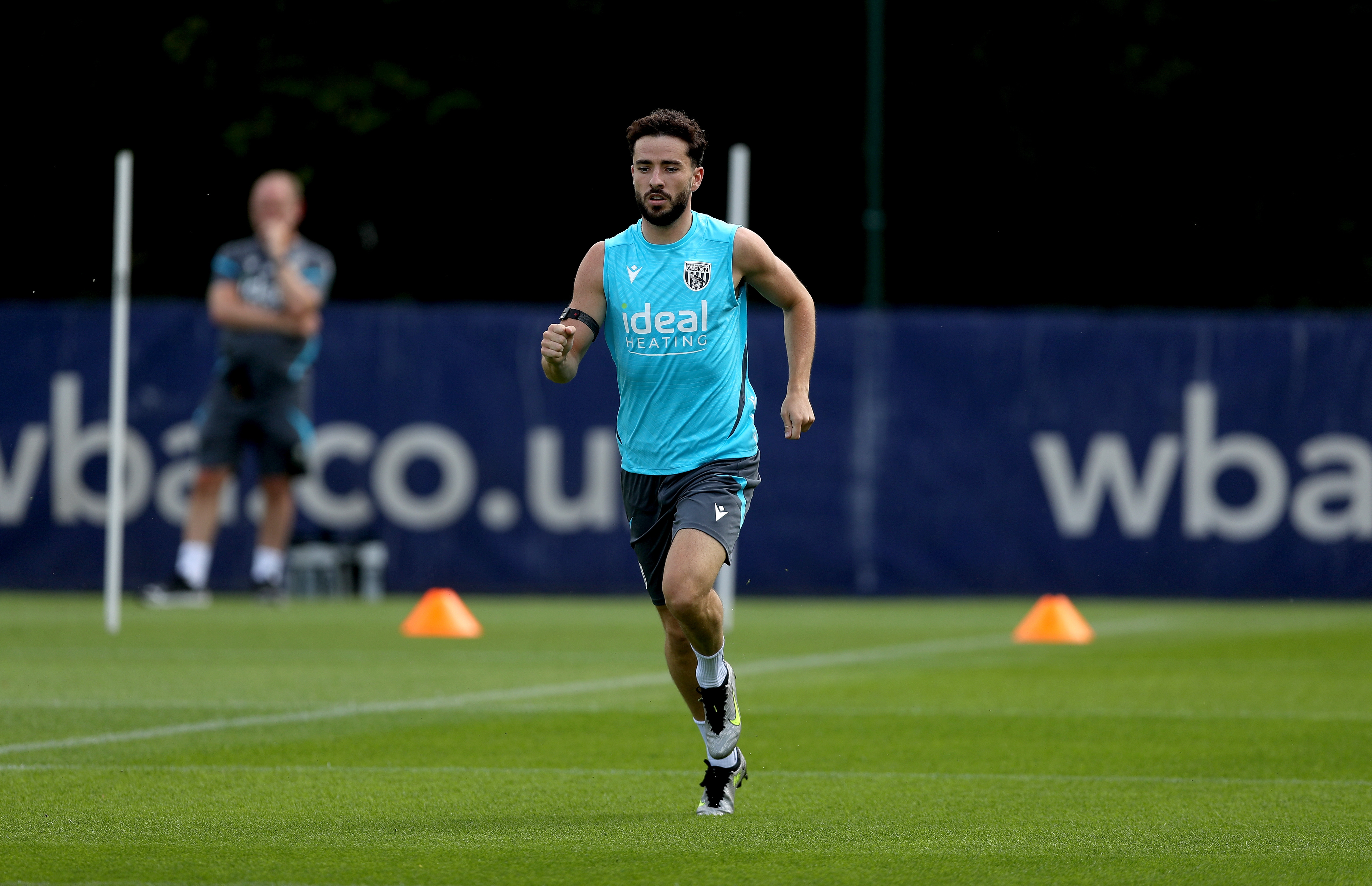 Mikey Johnston running during a training session