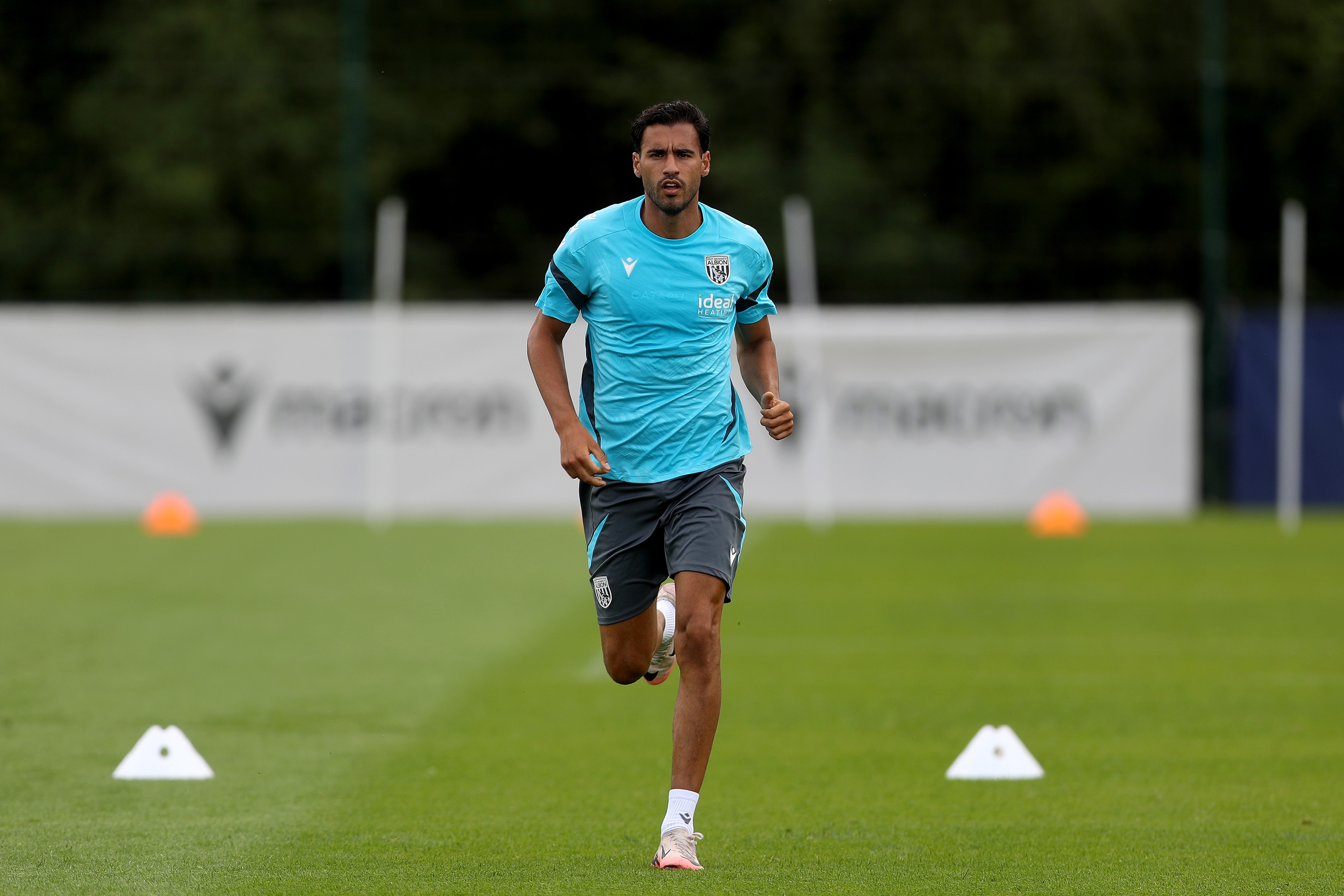 Gianluca Frabotta running during a training session