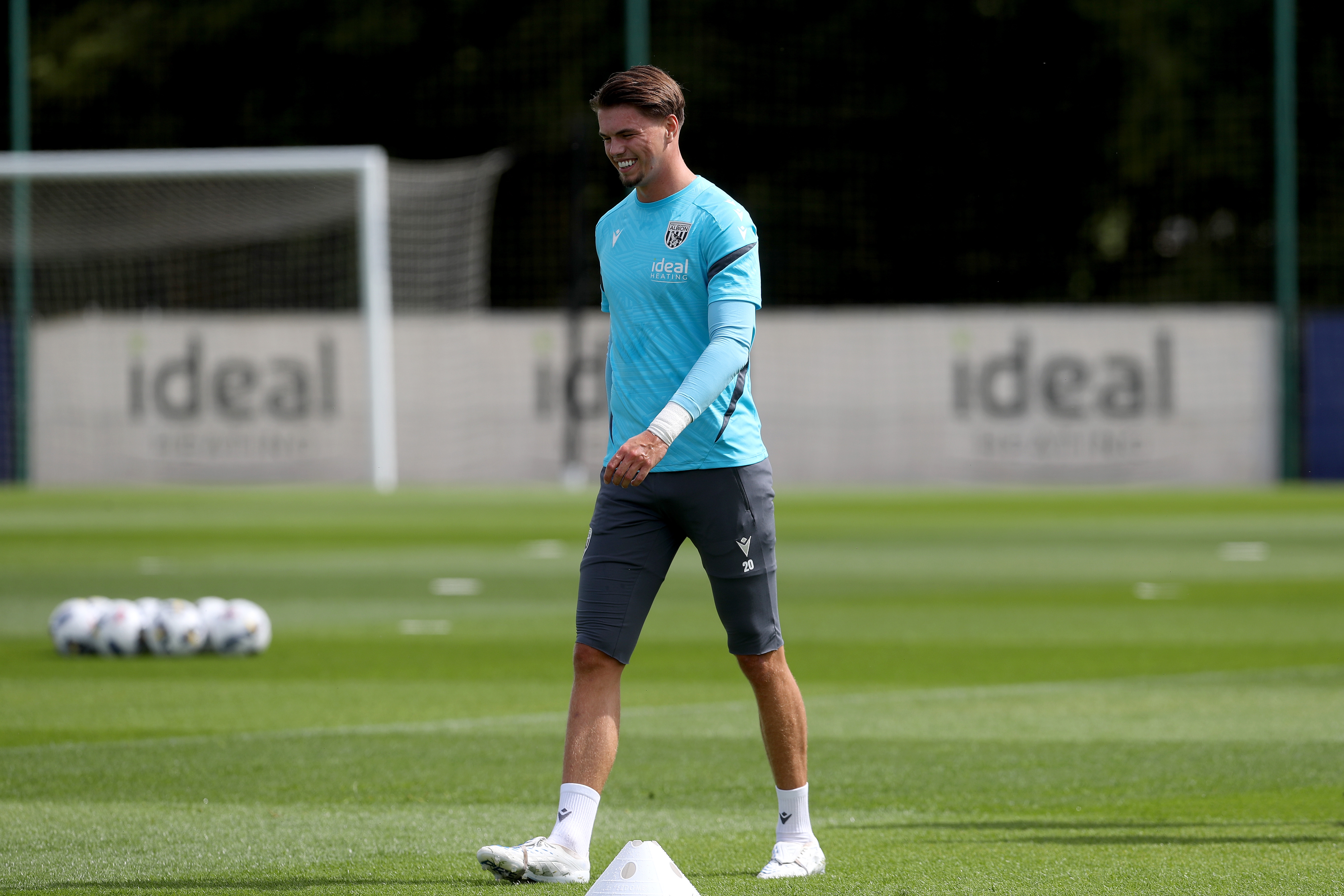 Josh Griffiths smiling during a training session