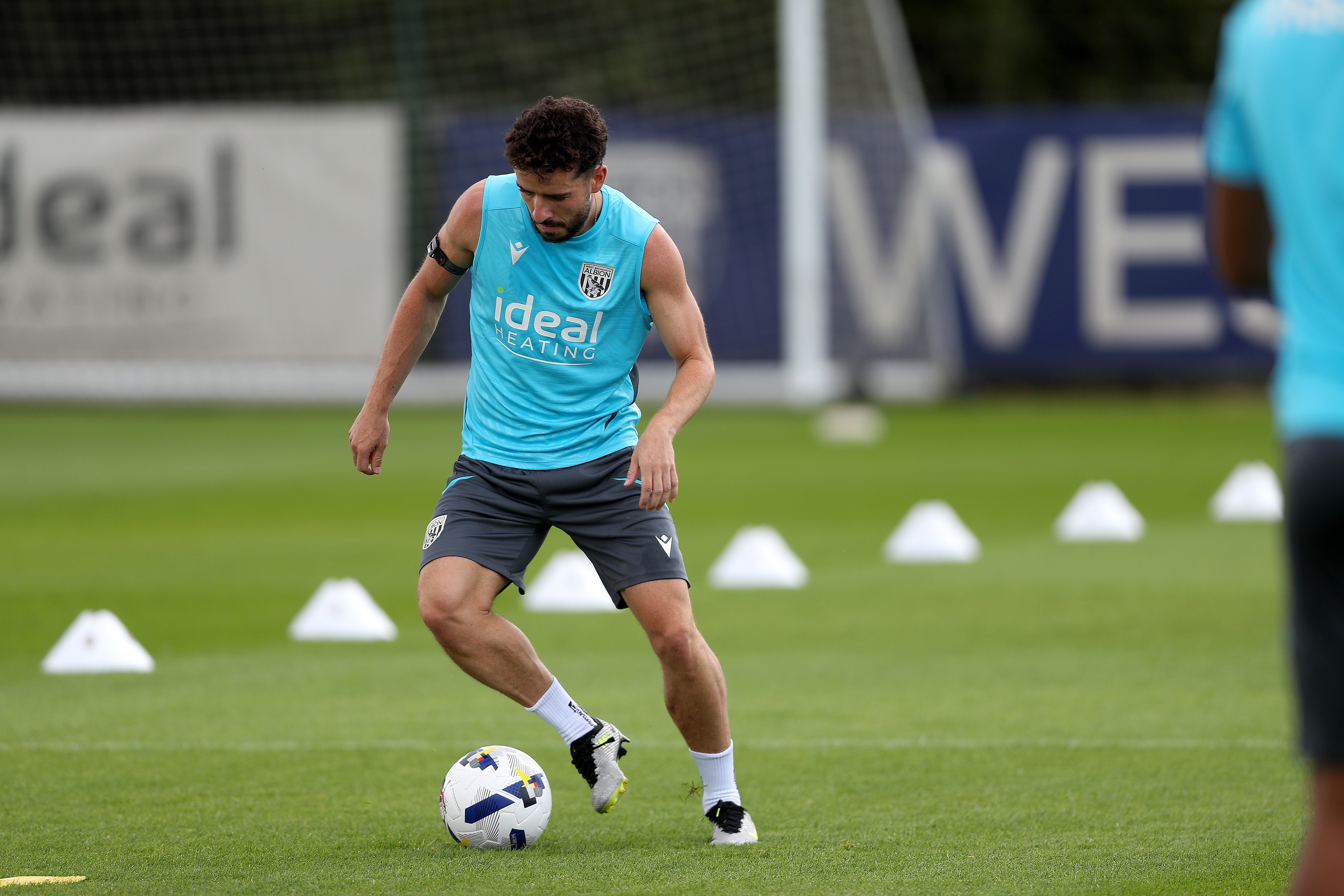 Mikey Johnston on the ball during a training session