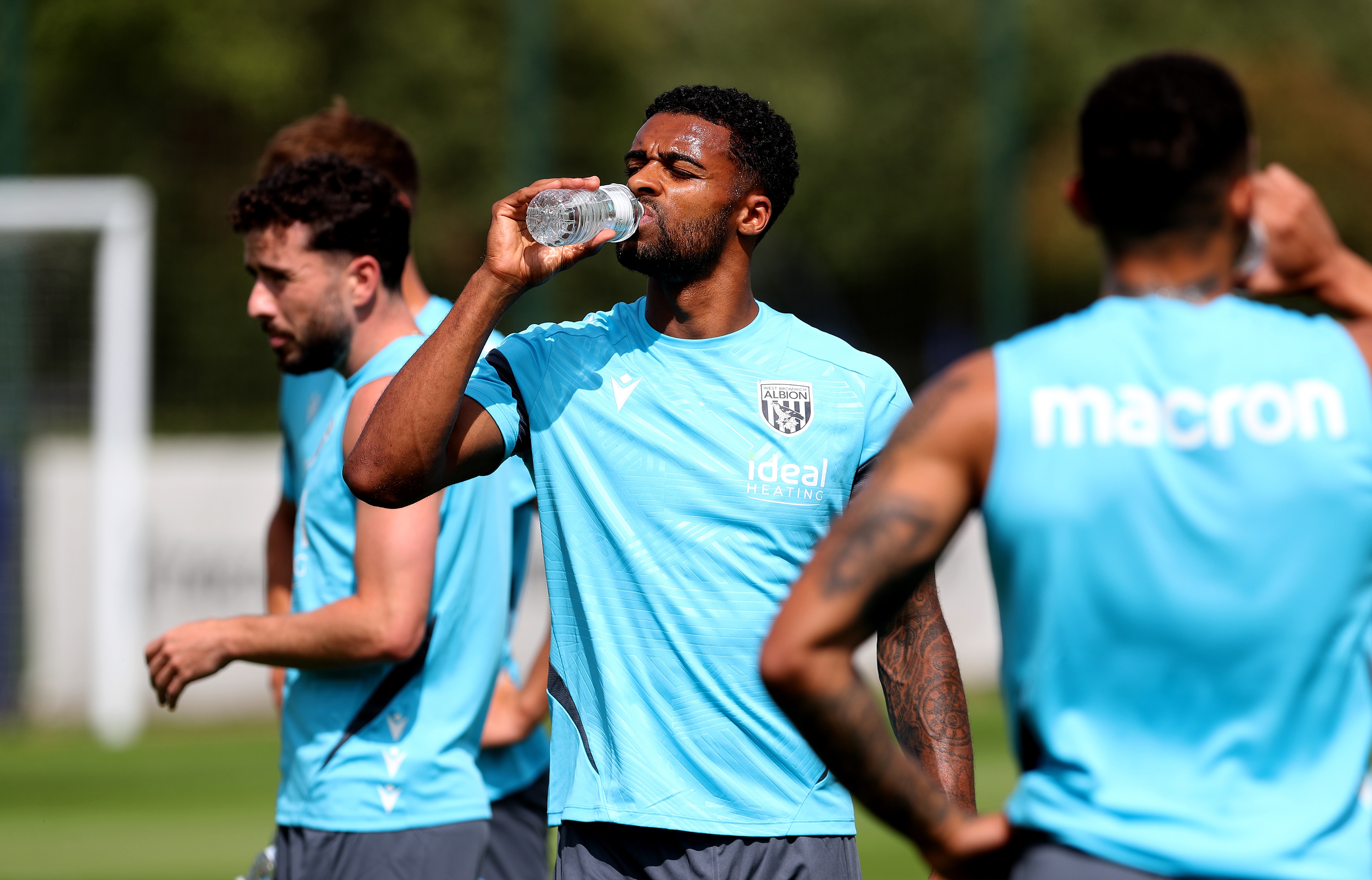 Darnell Furlong drinking water during a break in a training session