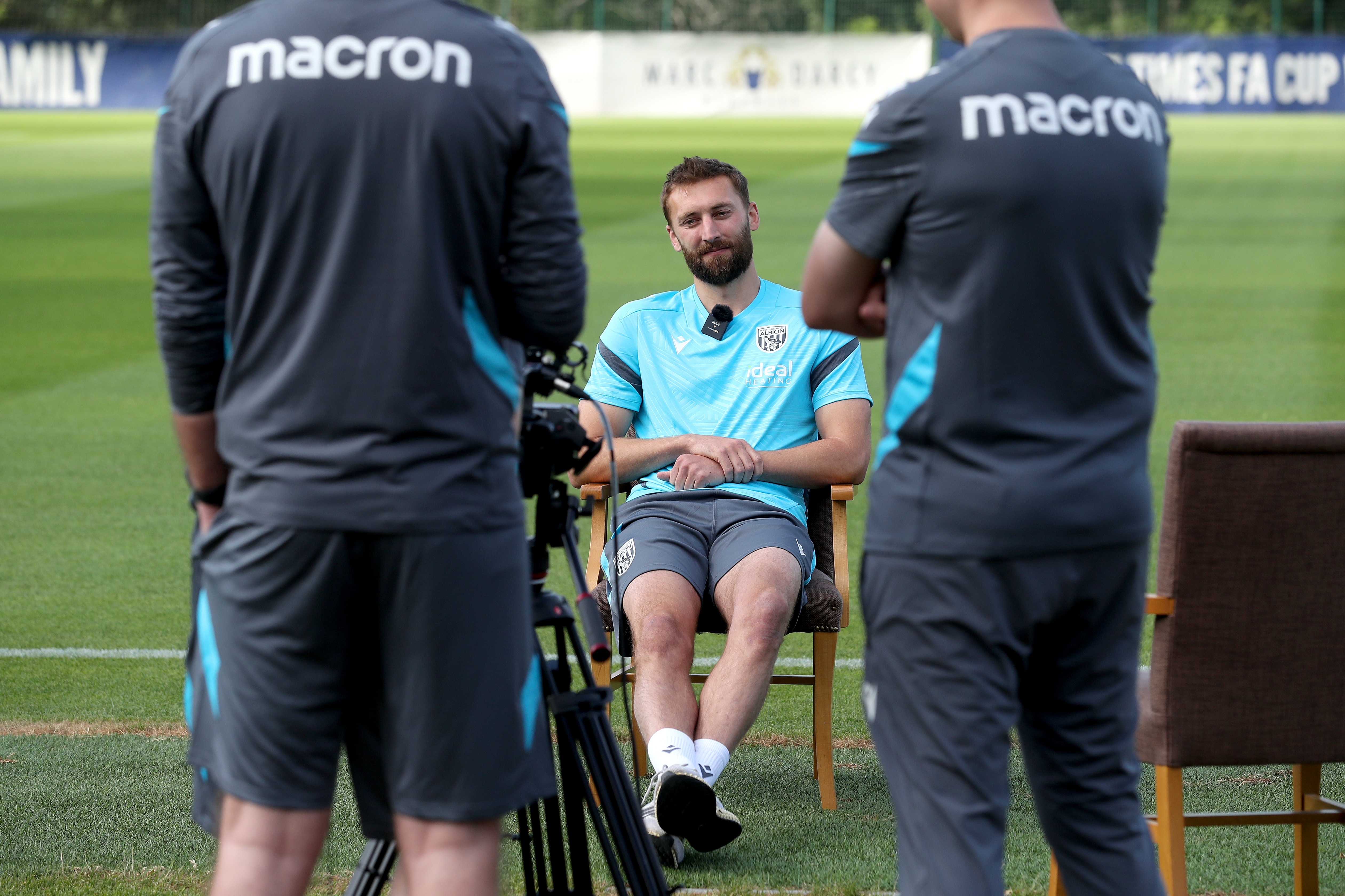 Nat Phillips is interviewed out on a training pitch