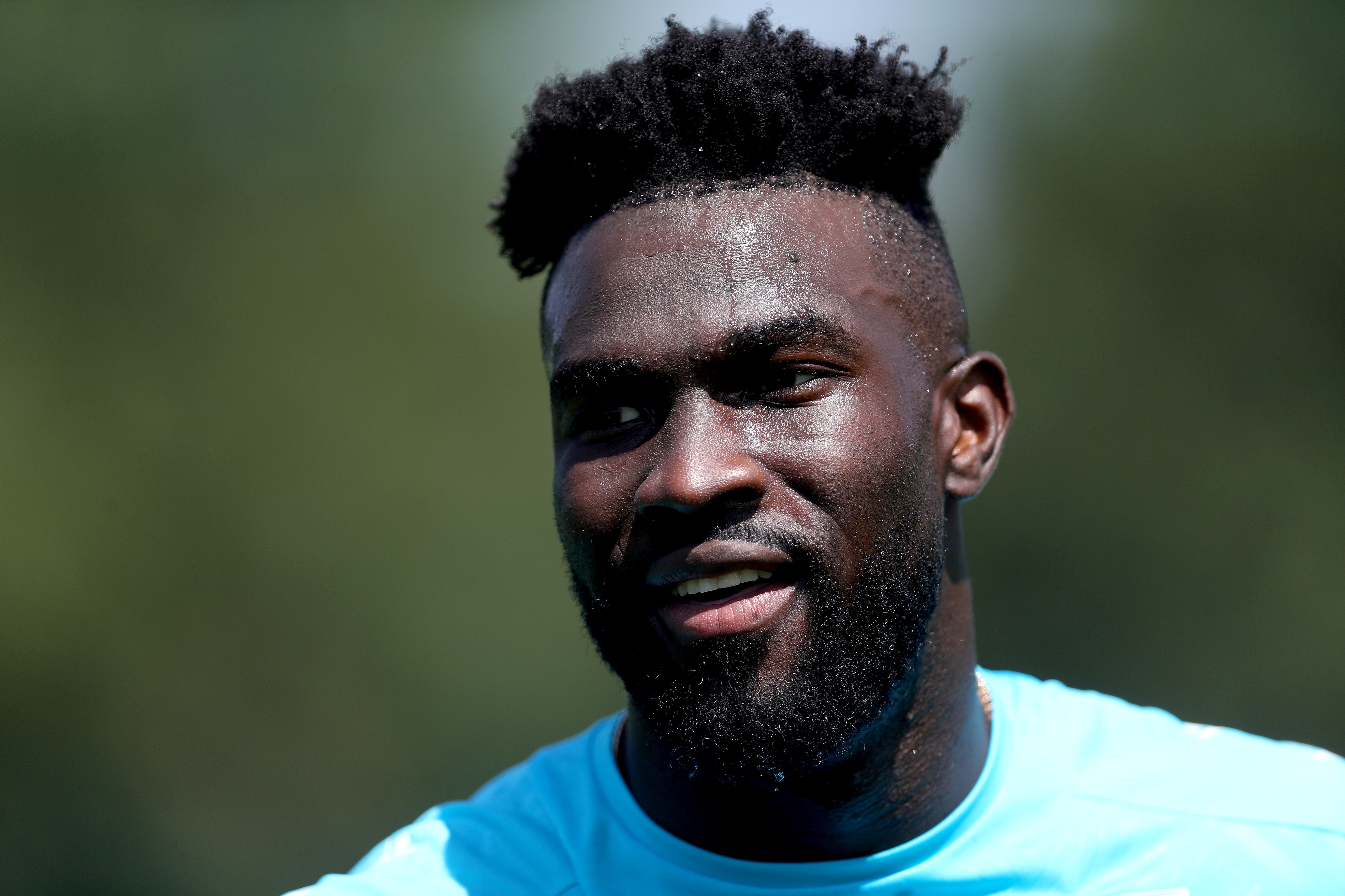 Daryl Dike smiling during a training session