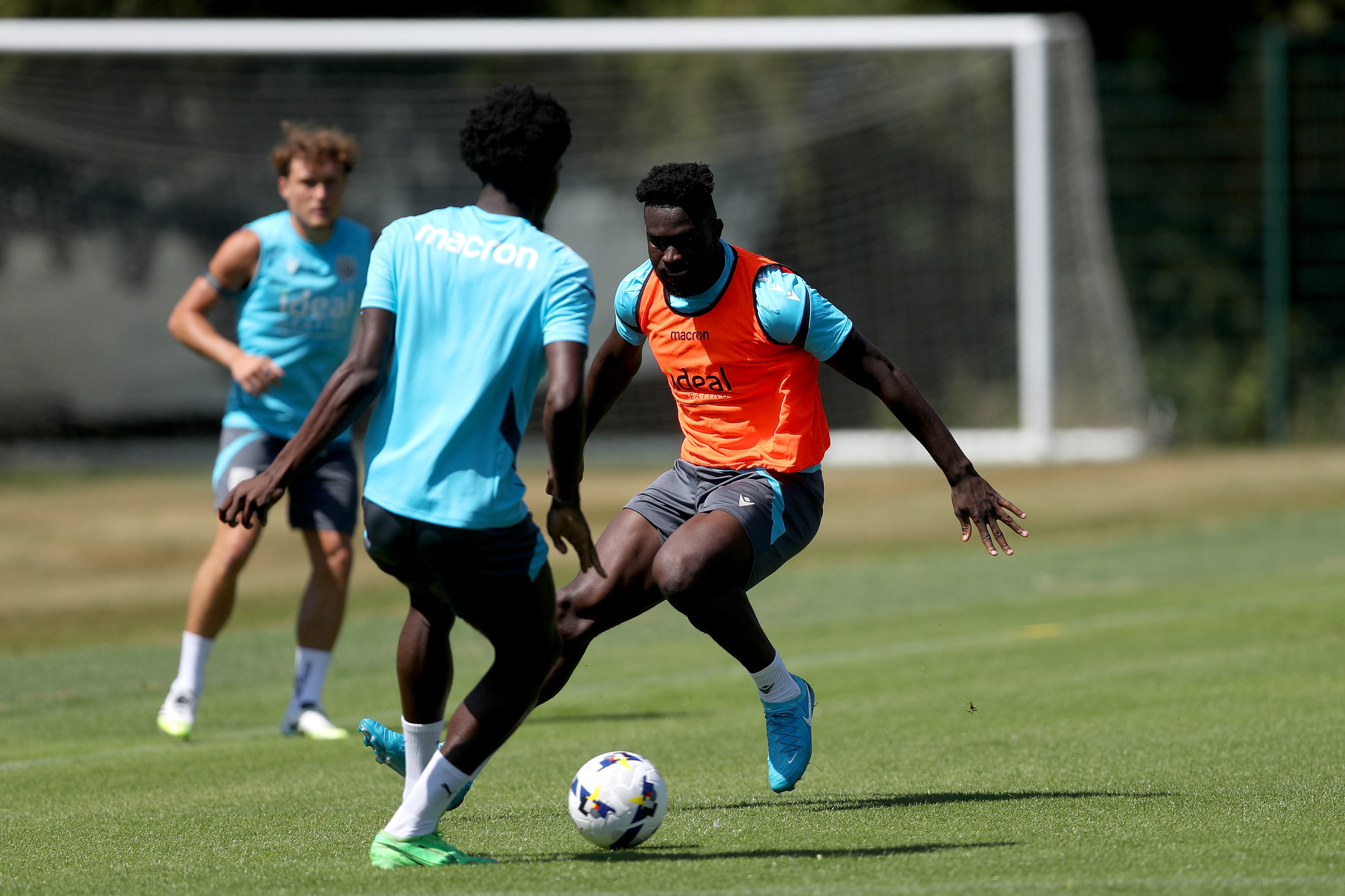 Daryl Dike closing down a player during a training session