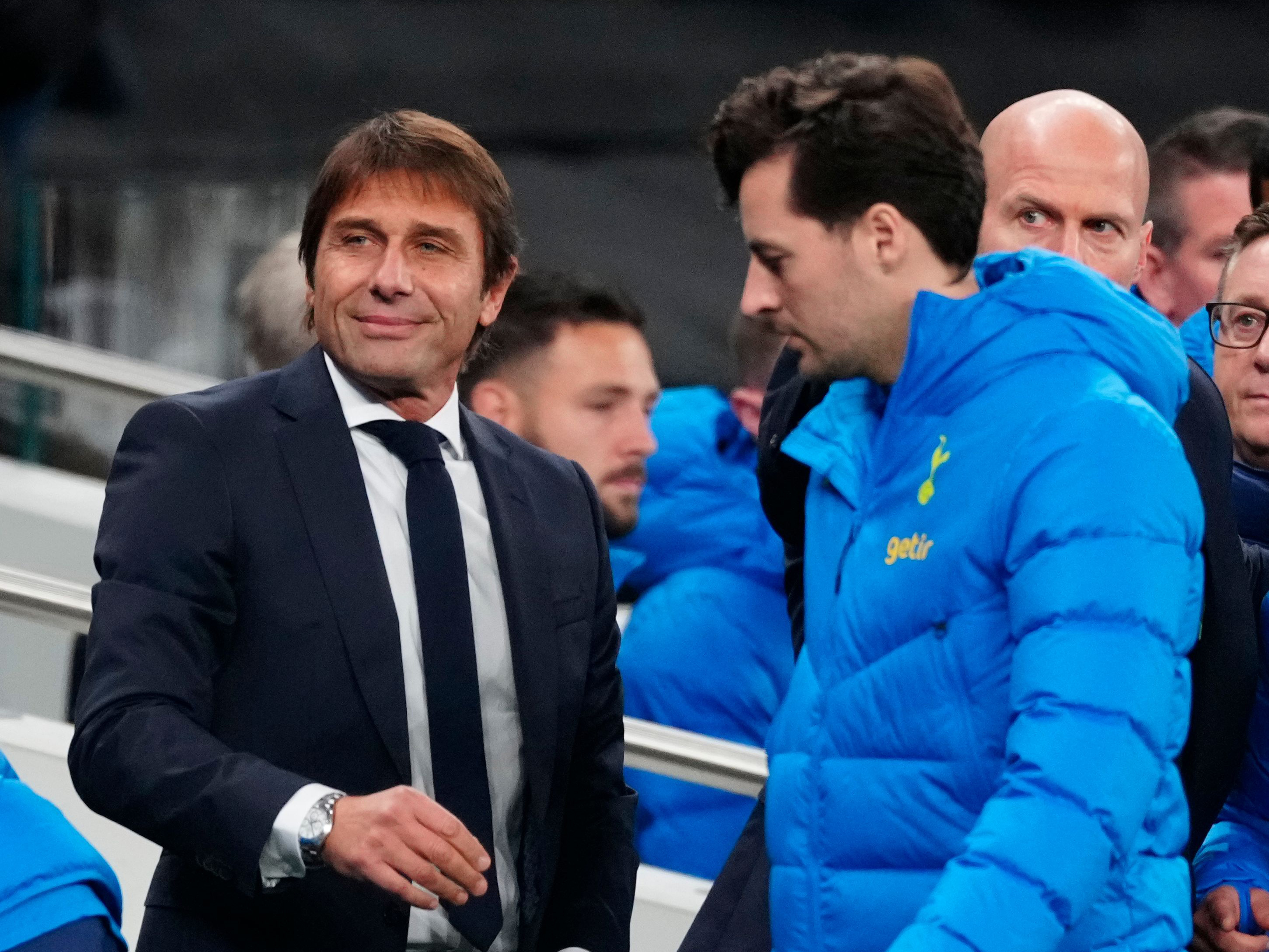 An image of Antonio Conte and Ryan Mason