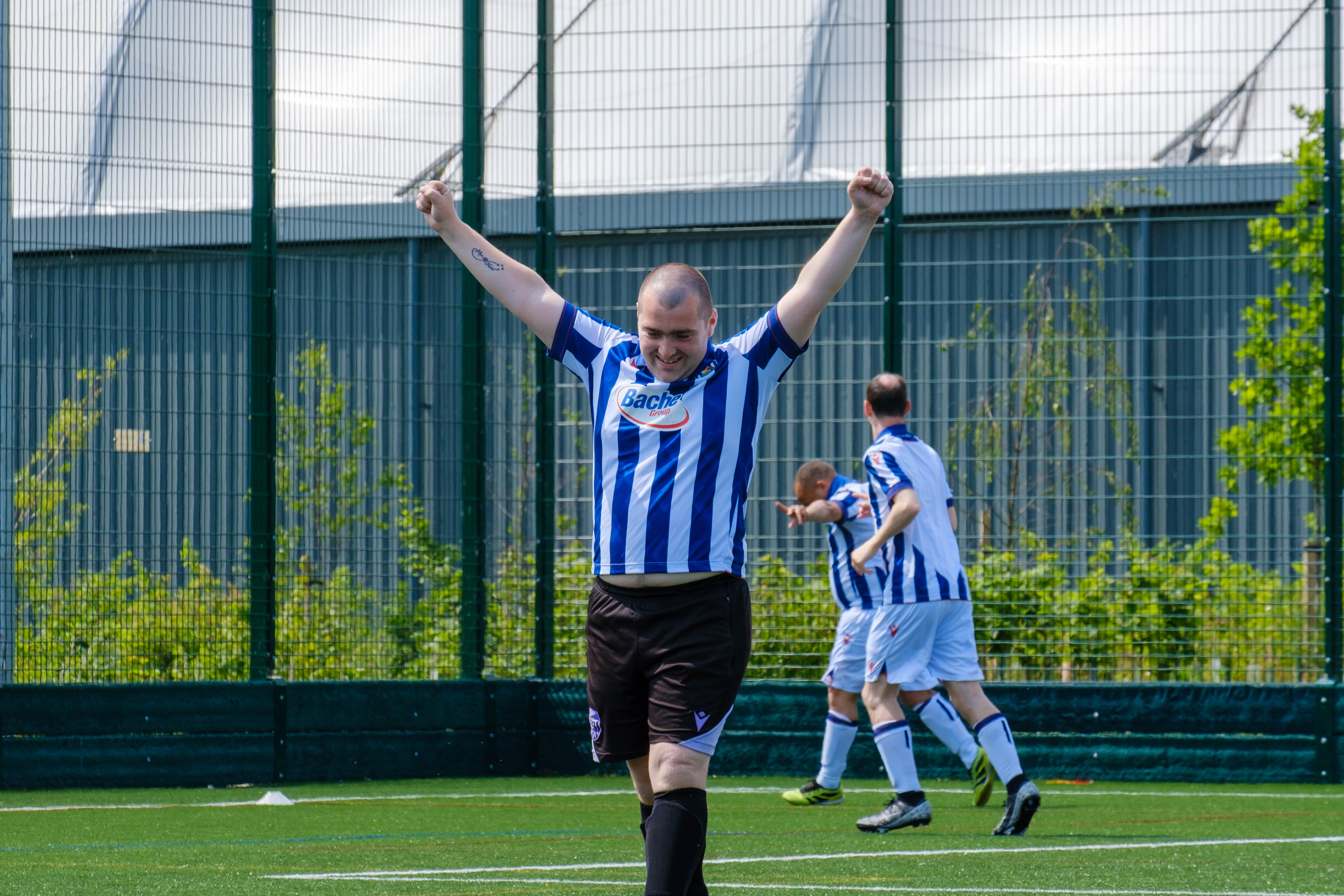 Adam celebrates.