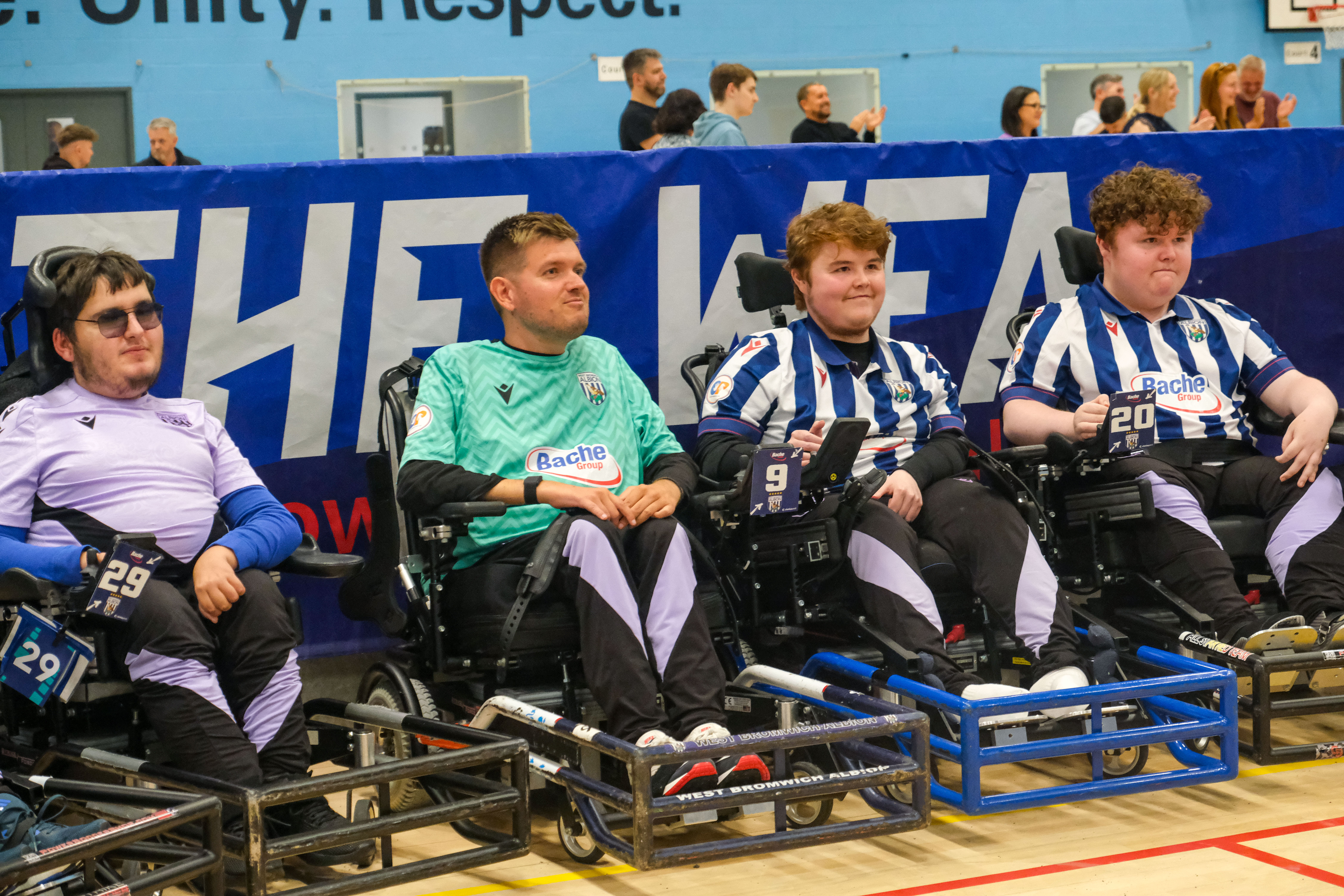 Albion Powerchair pose for a photo.