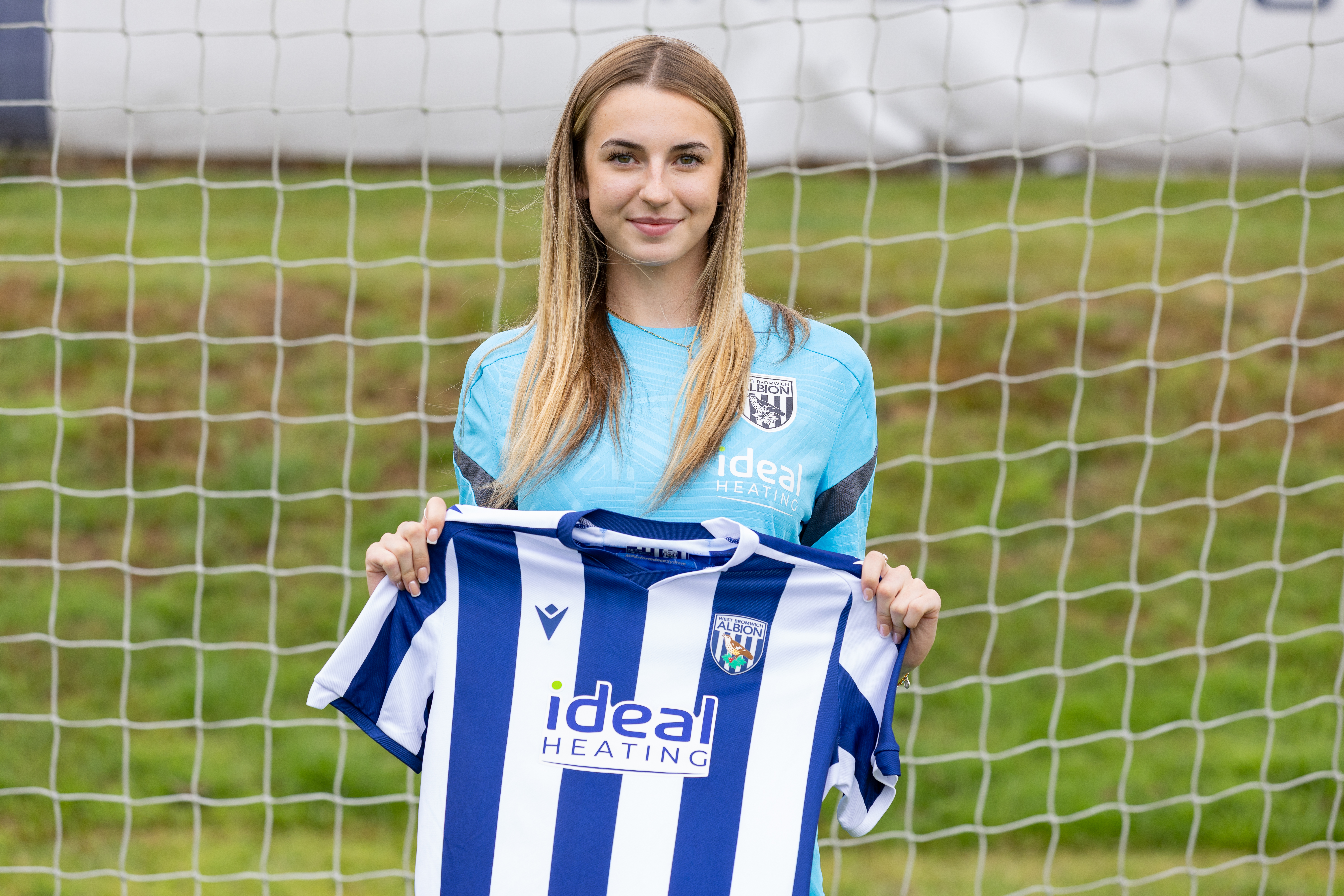 Ruby Heselden with an Albion home shirt.