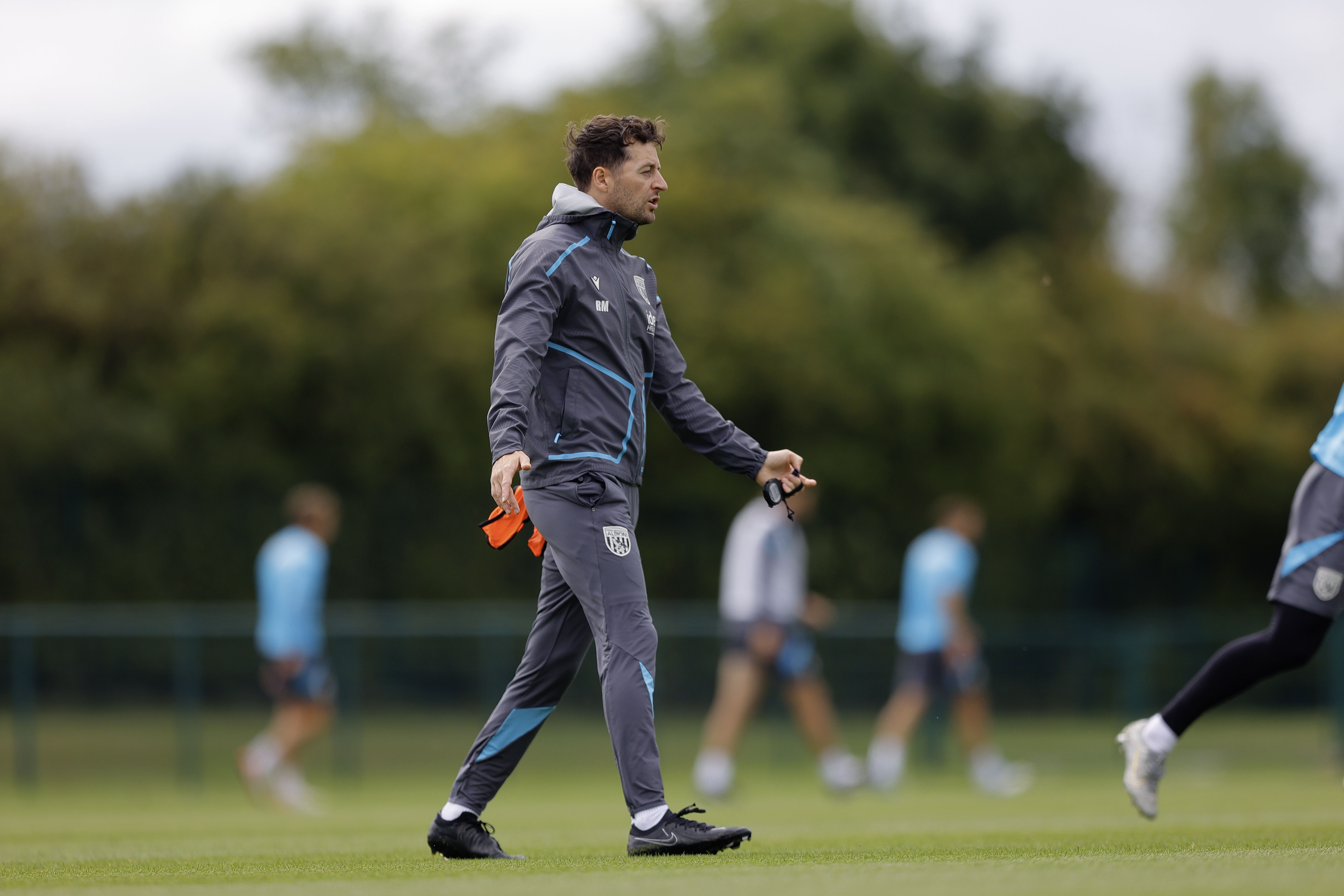 Ryan Mason delivering instructions during a training session