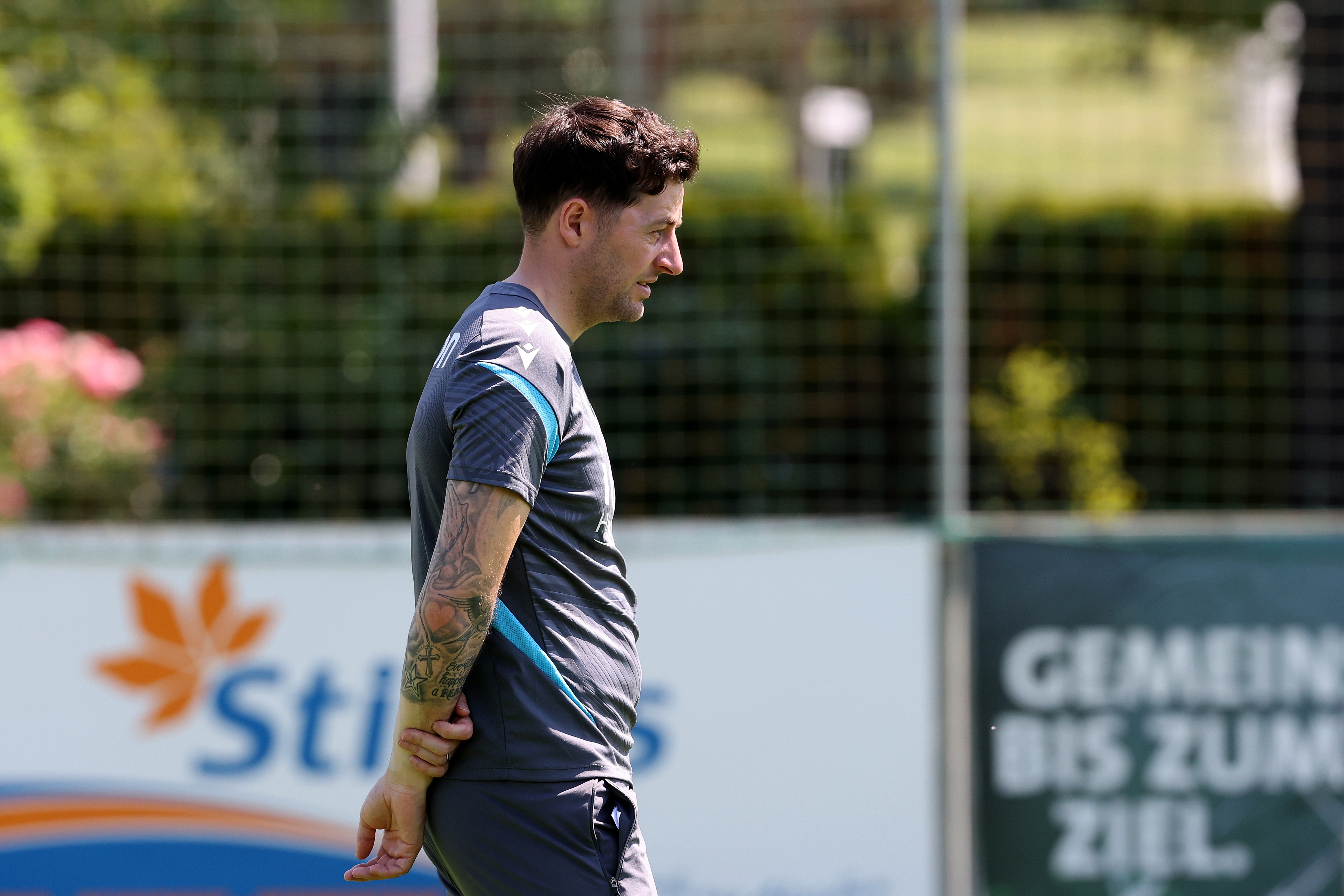 Ryan Mason watching a training session in Austria