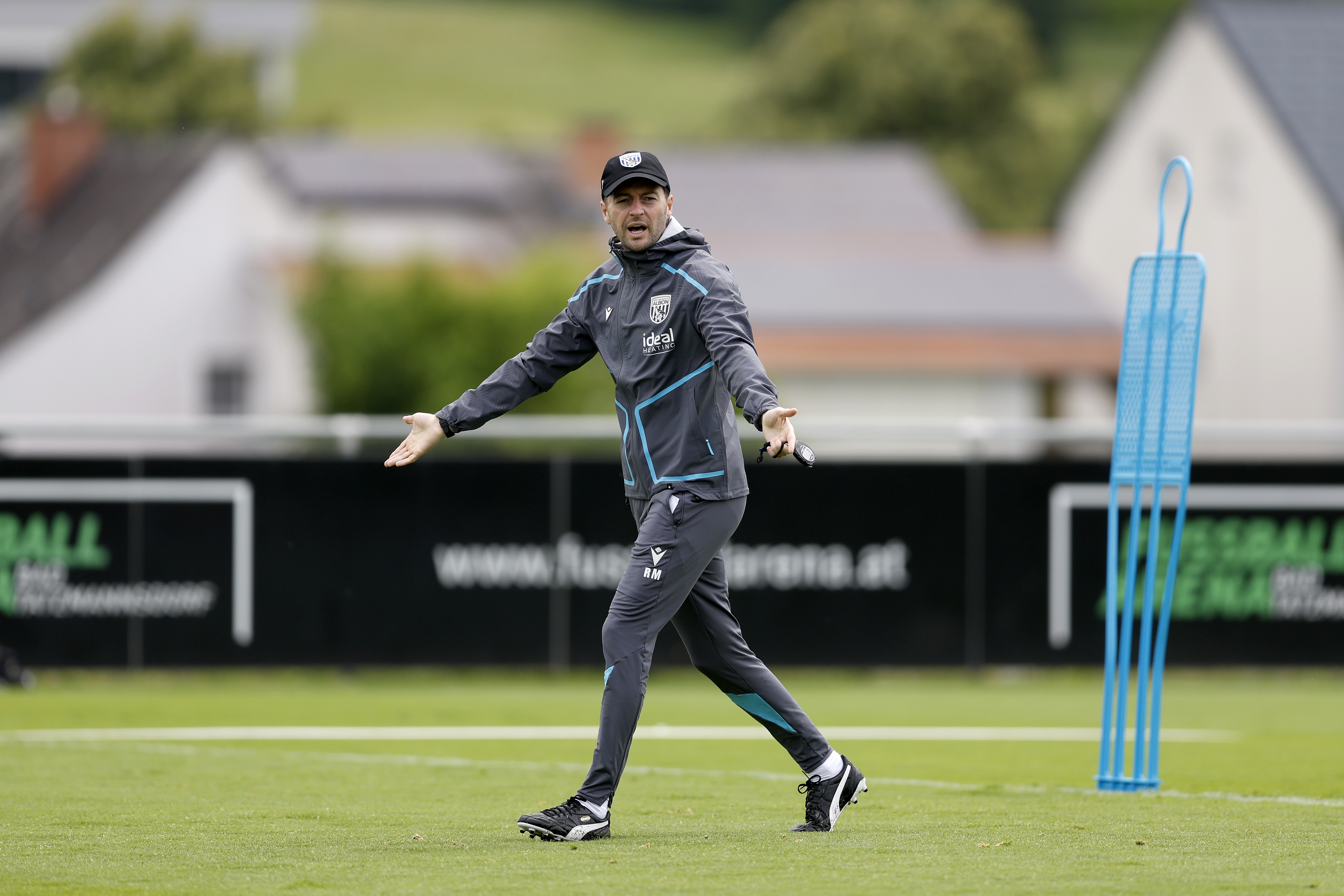 Ryan Mason giving instructions on the training pitch