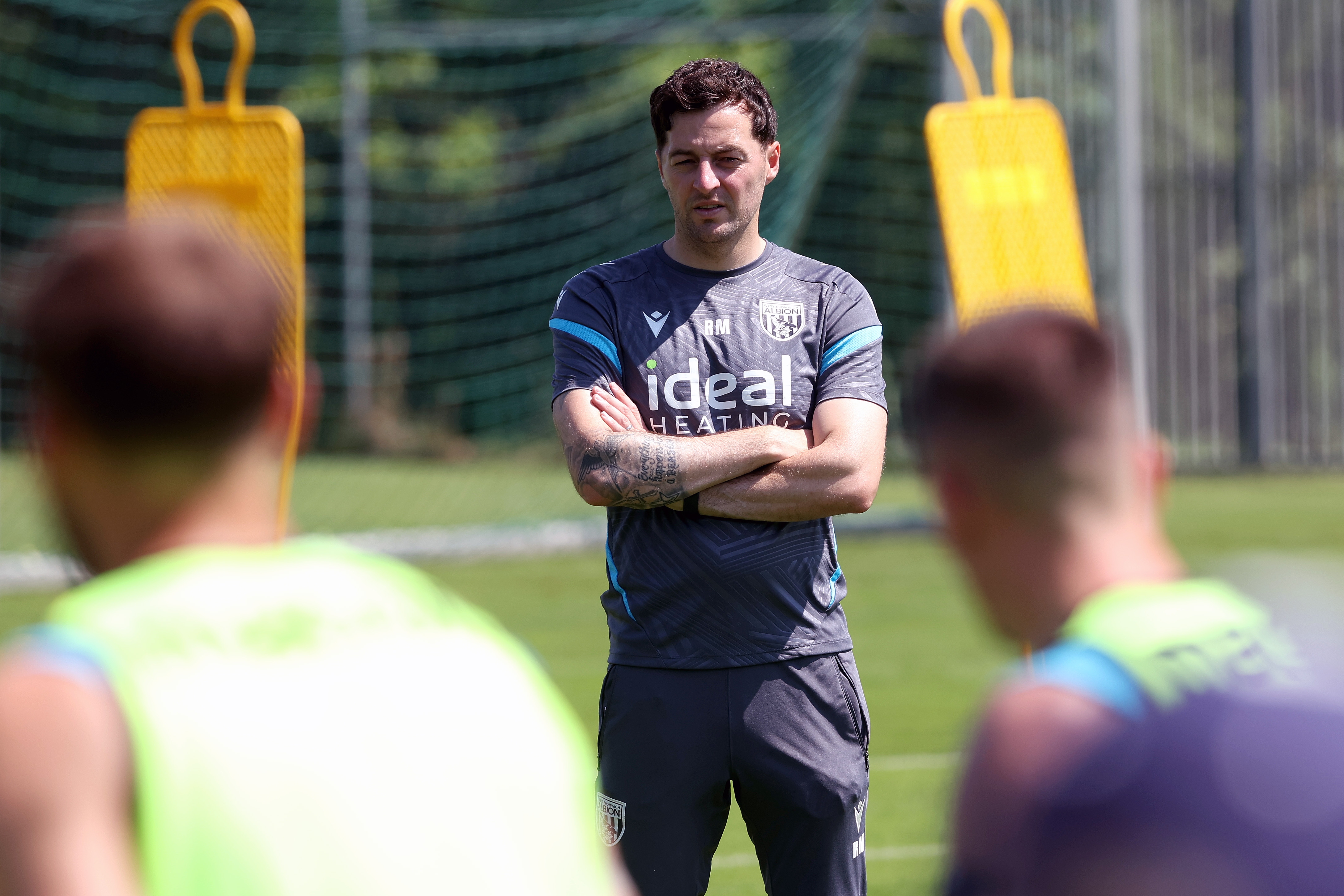 Ryan Mason watching a training session in Austria