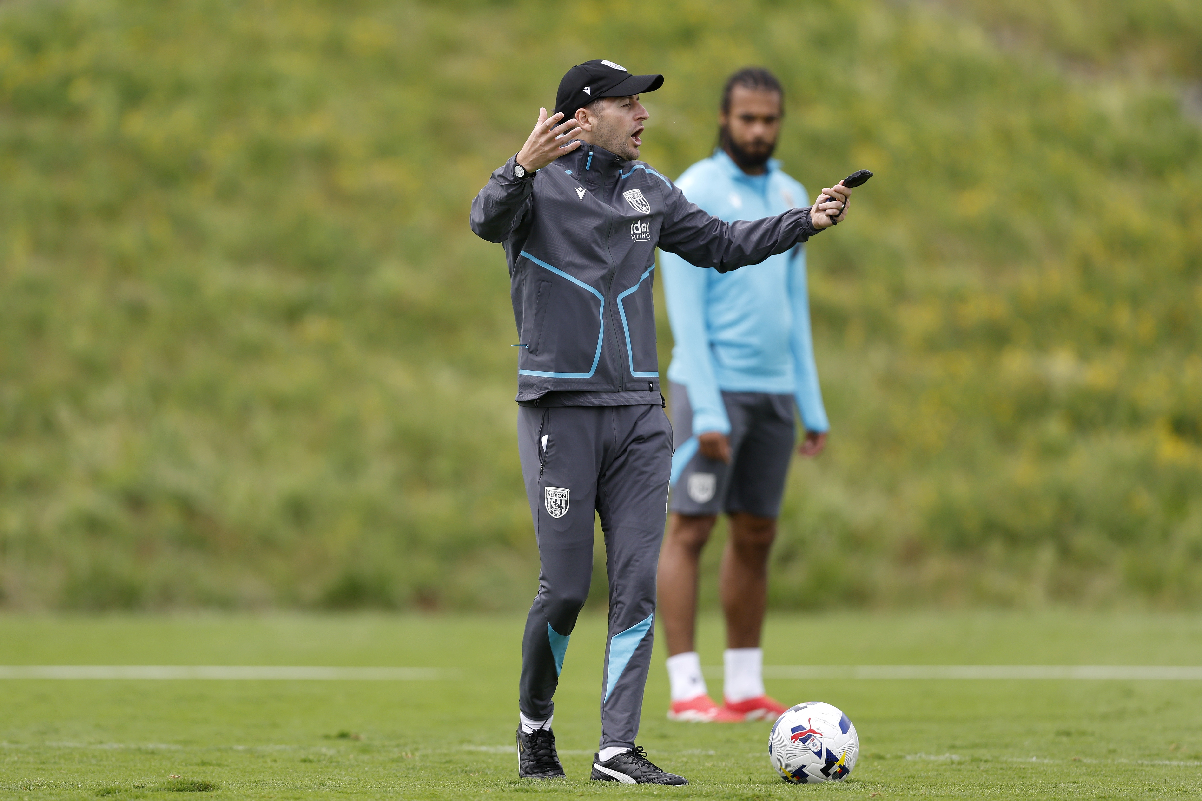 Ryan Mason giving instructions on the training pitch