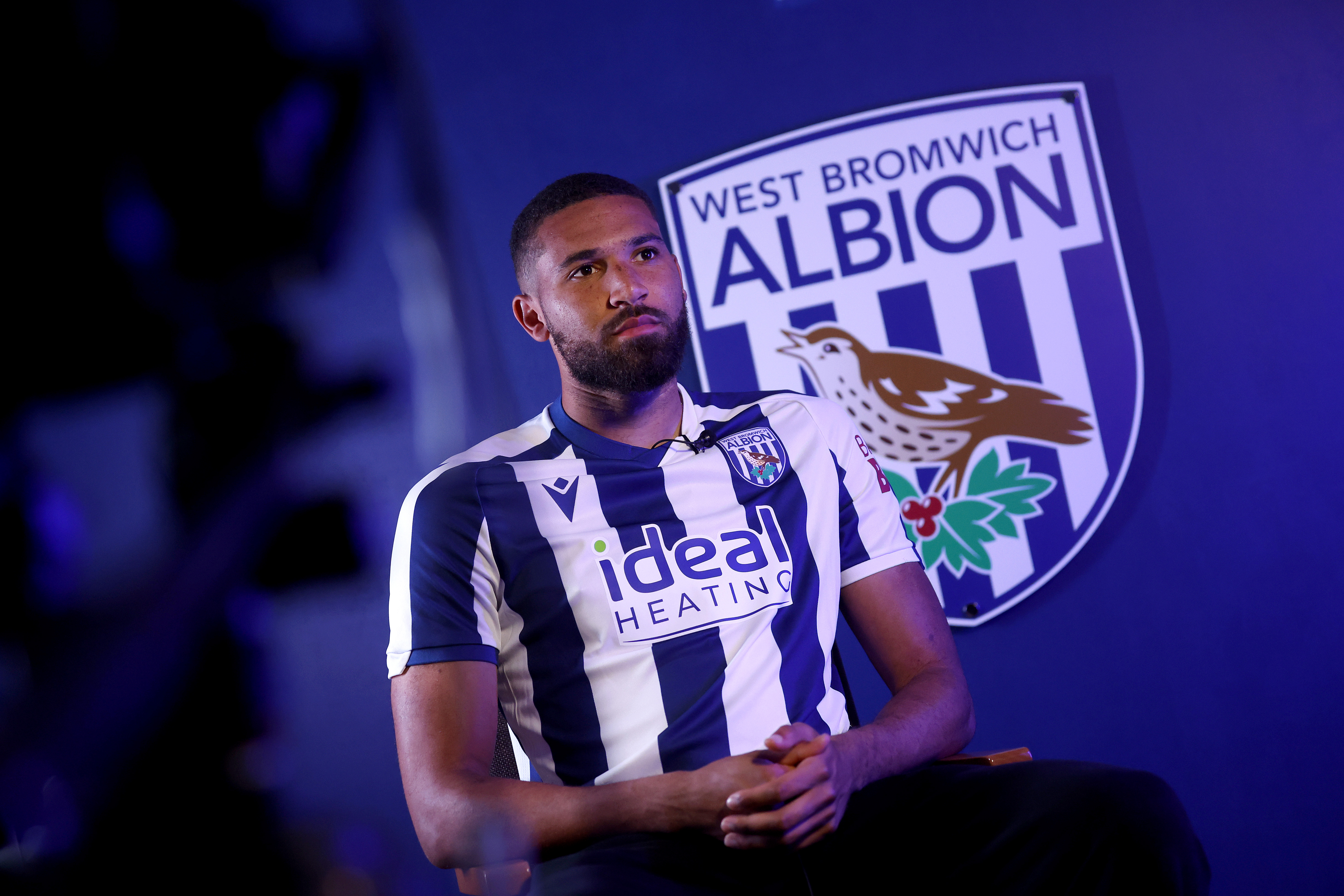 George Campbell sat in a WBA home shirt and being interviewed by WBA TV