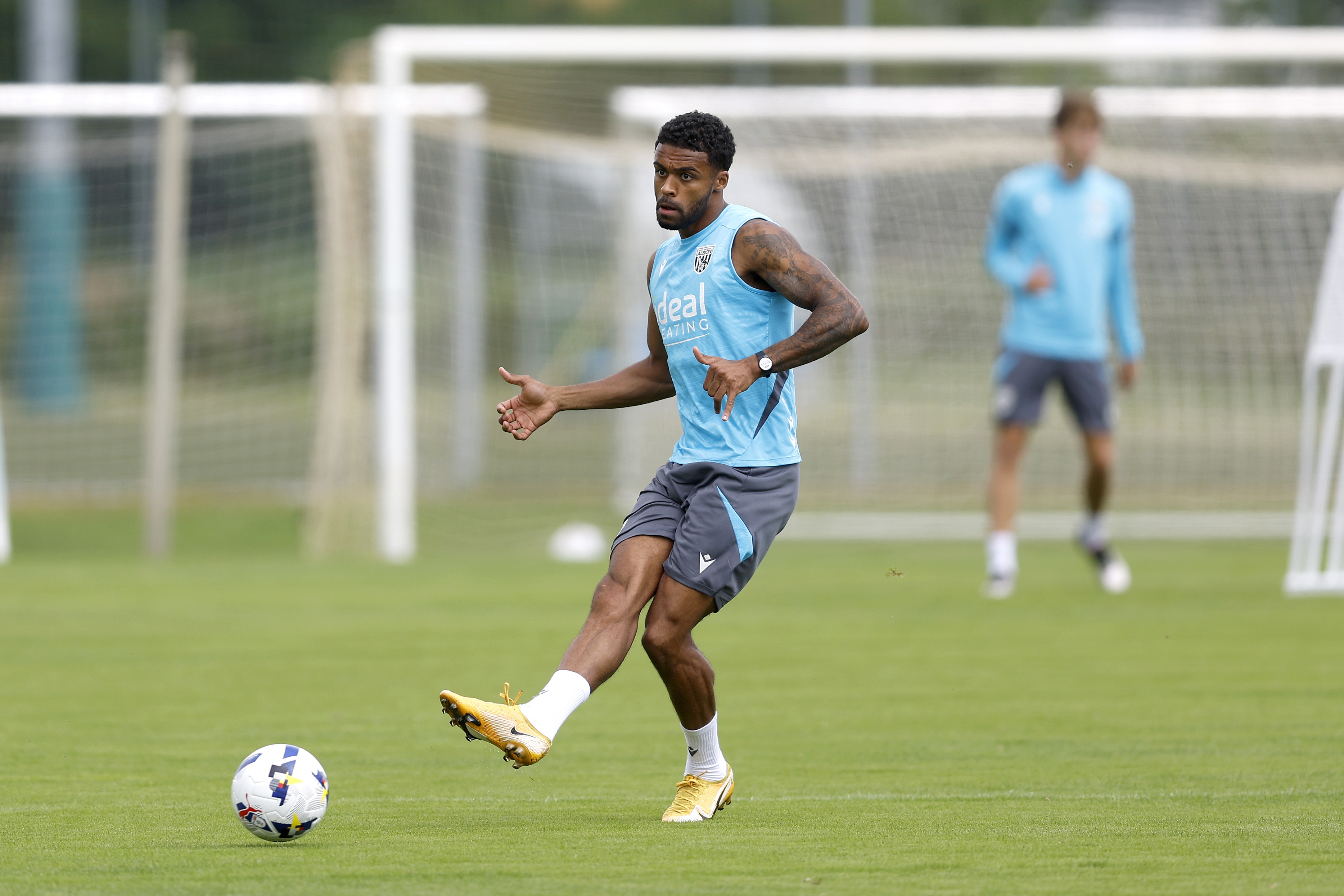 Darnell Furlong passing the ball during a training session in Austria