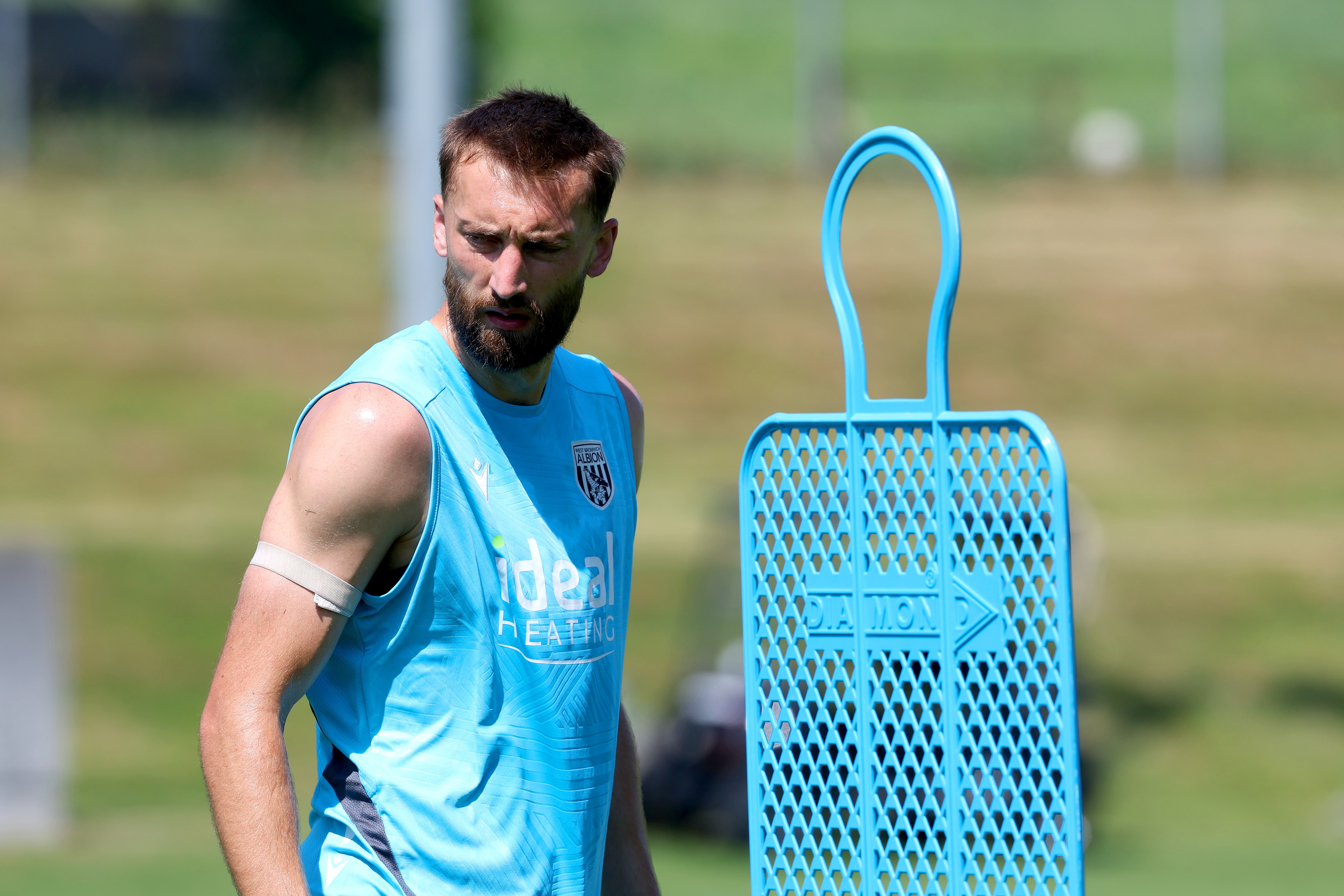 Nat Phillips looking to his right during a training session