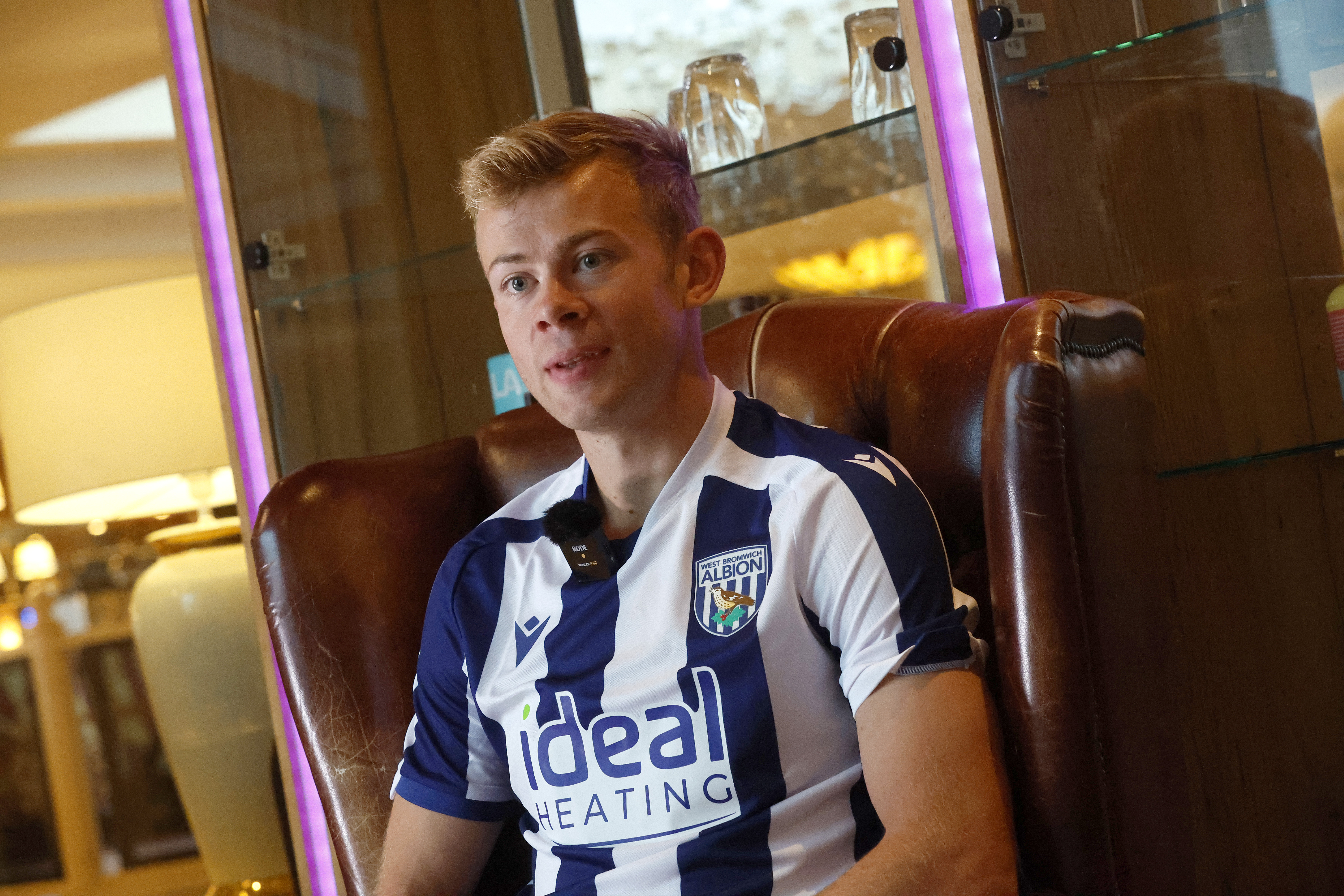 Aune Heggebø sat in a WBA shirt in a chair being interviewed by WBA TV