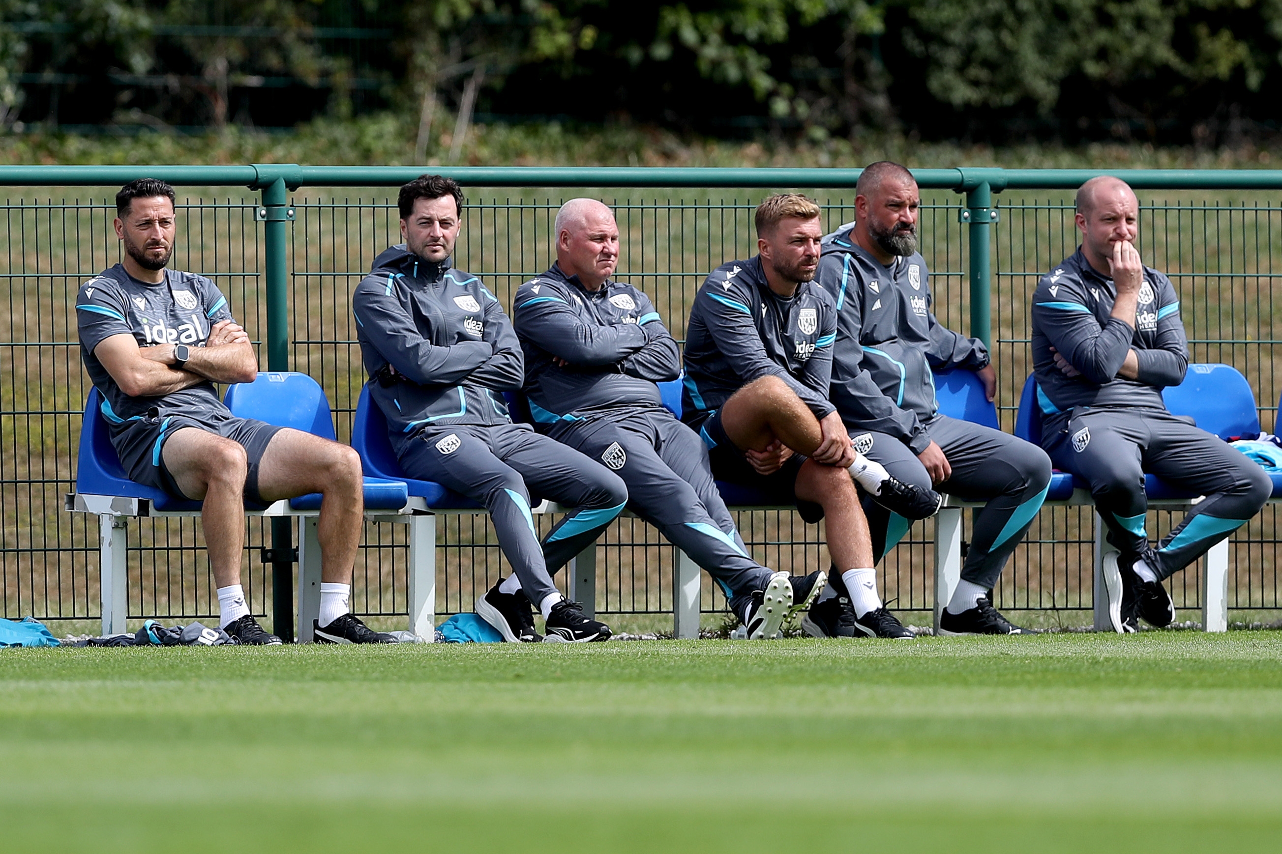 Albion's coaching staff sat watching WBA v Port Vale 