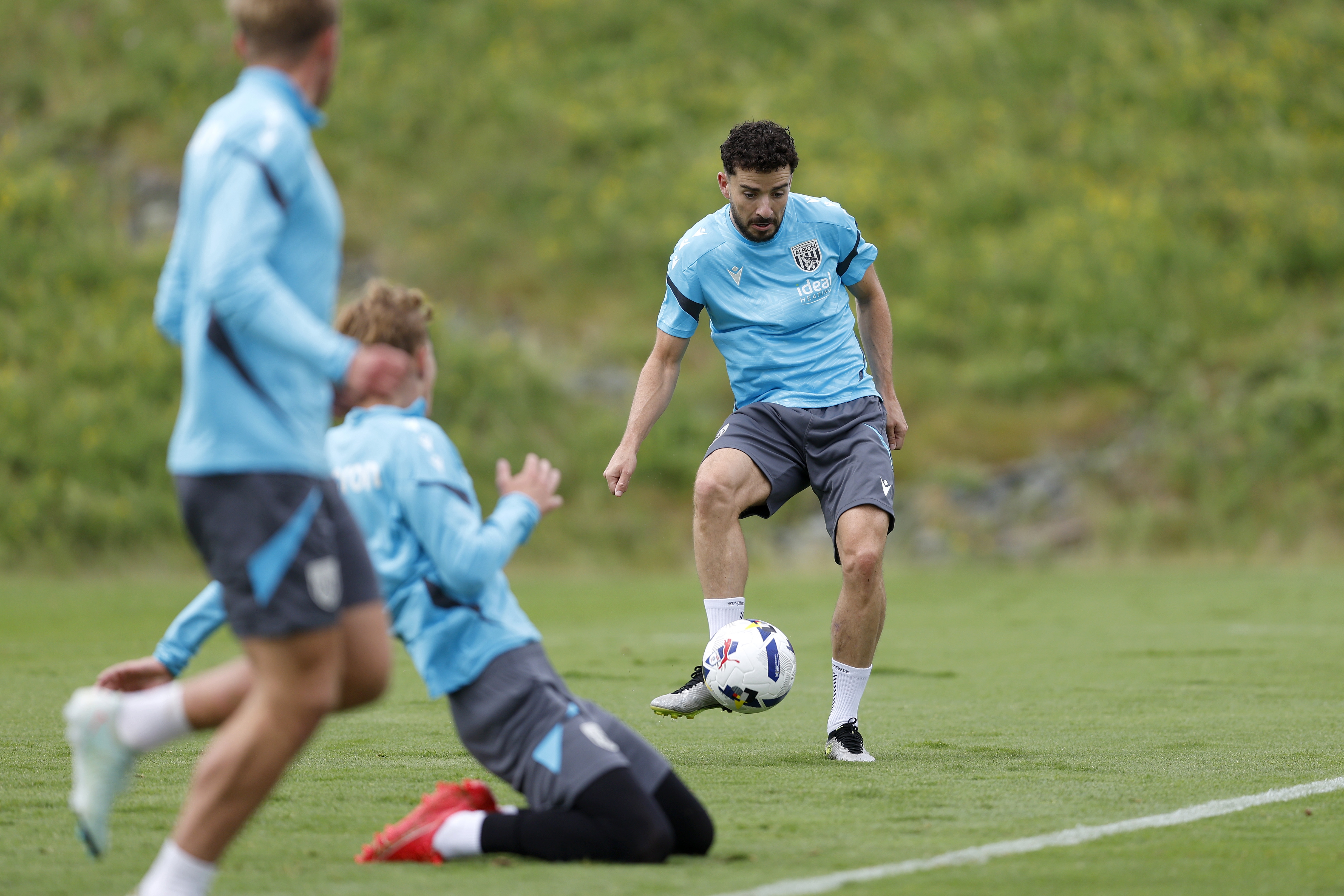 Mikey Johnston on the ball during training 