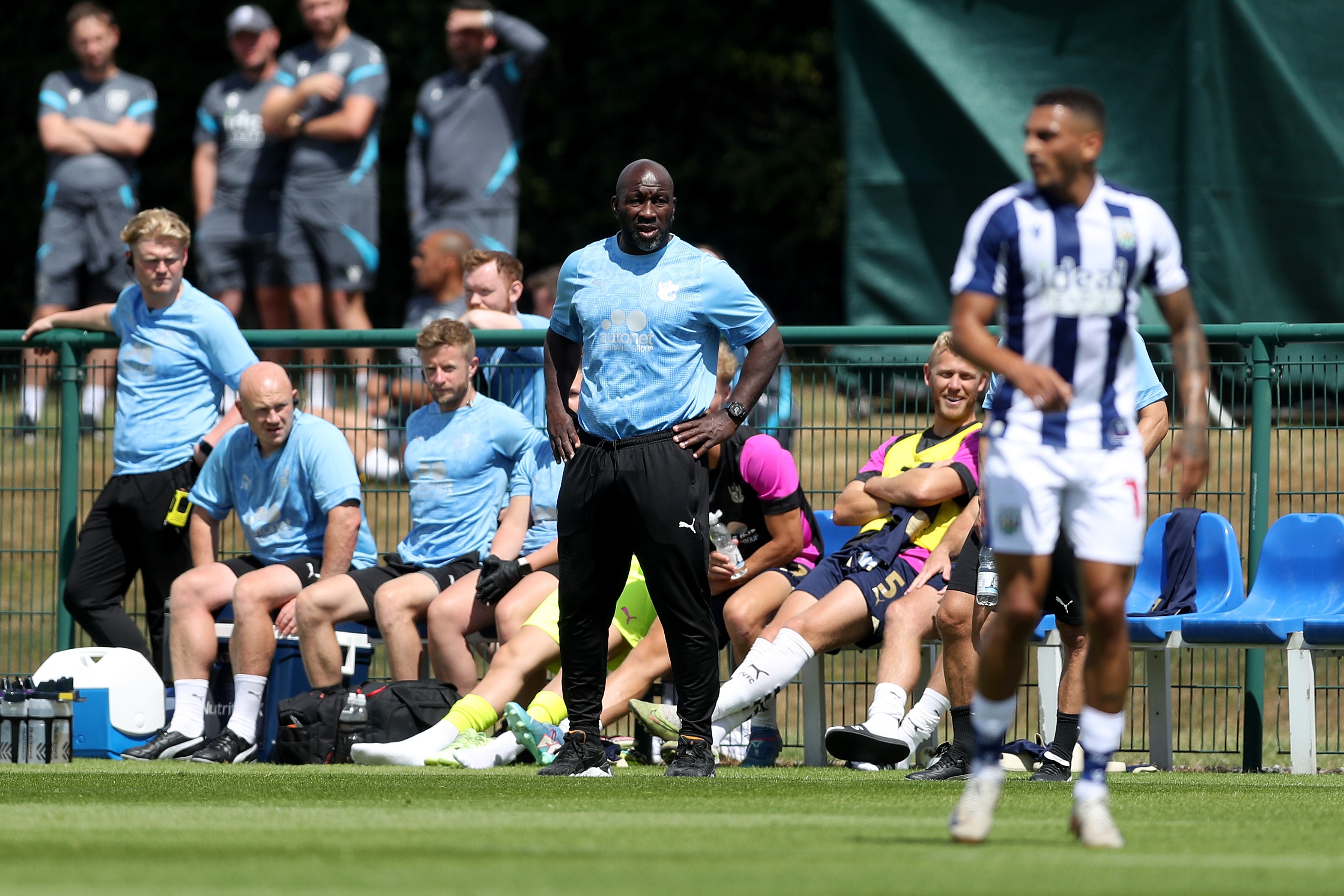 Port Vale boss Darren Moore watching WBA v Port Vale