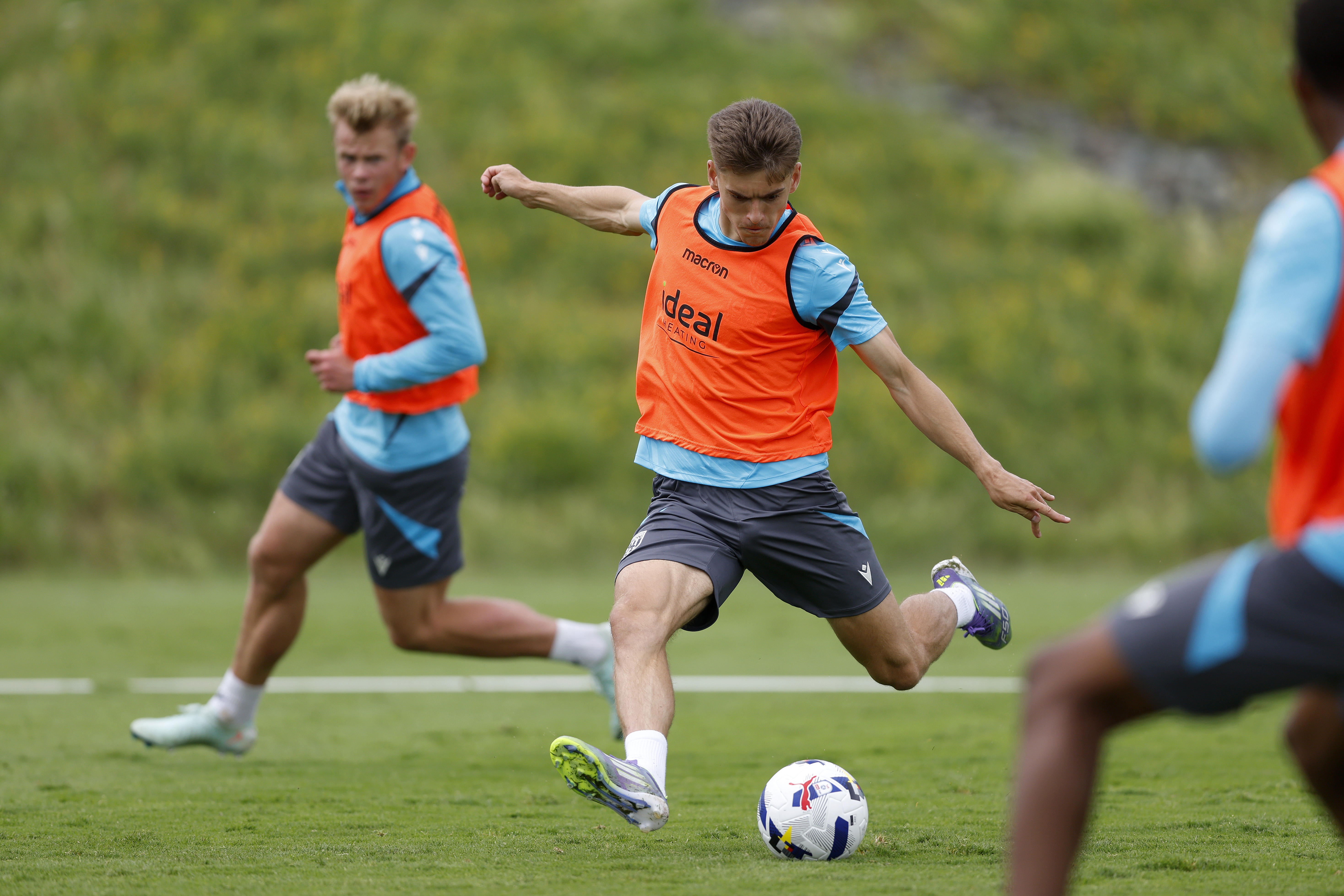 Tom Fellows striking the ball during training