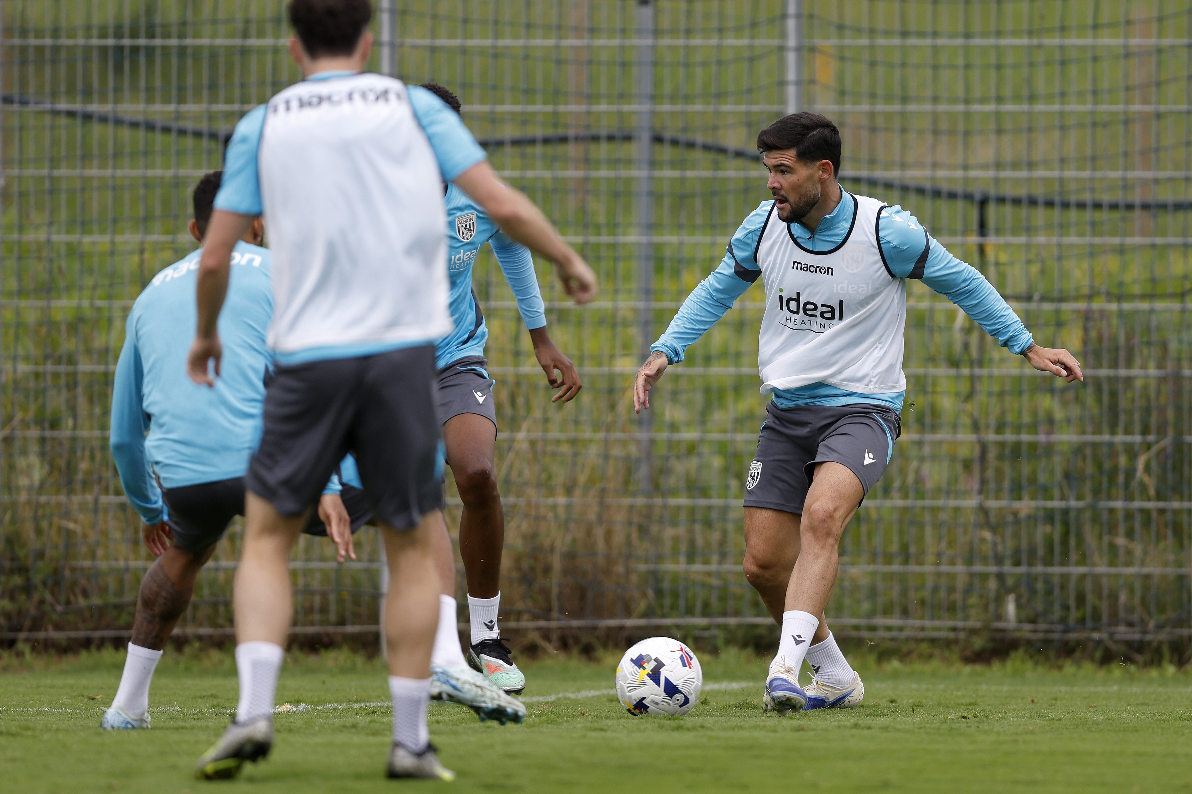 Alex Mowatt on the ball during training 