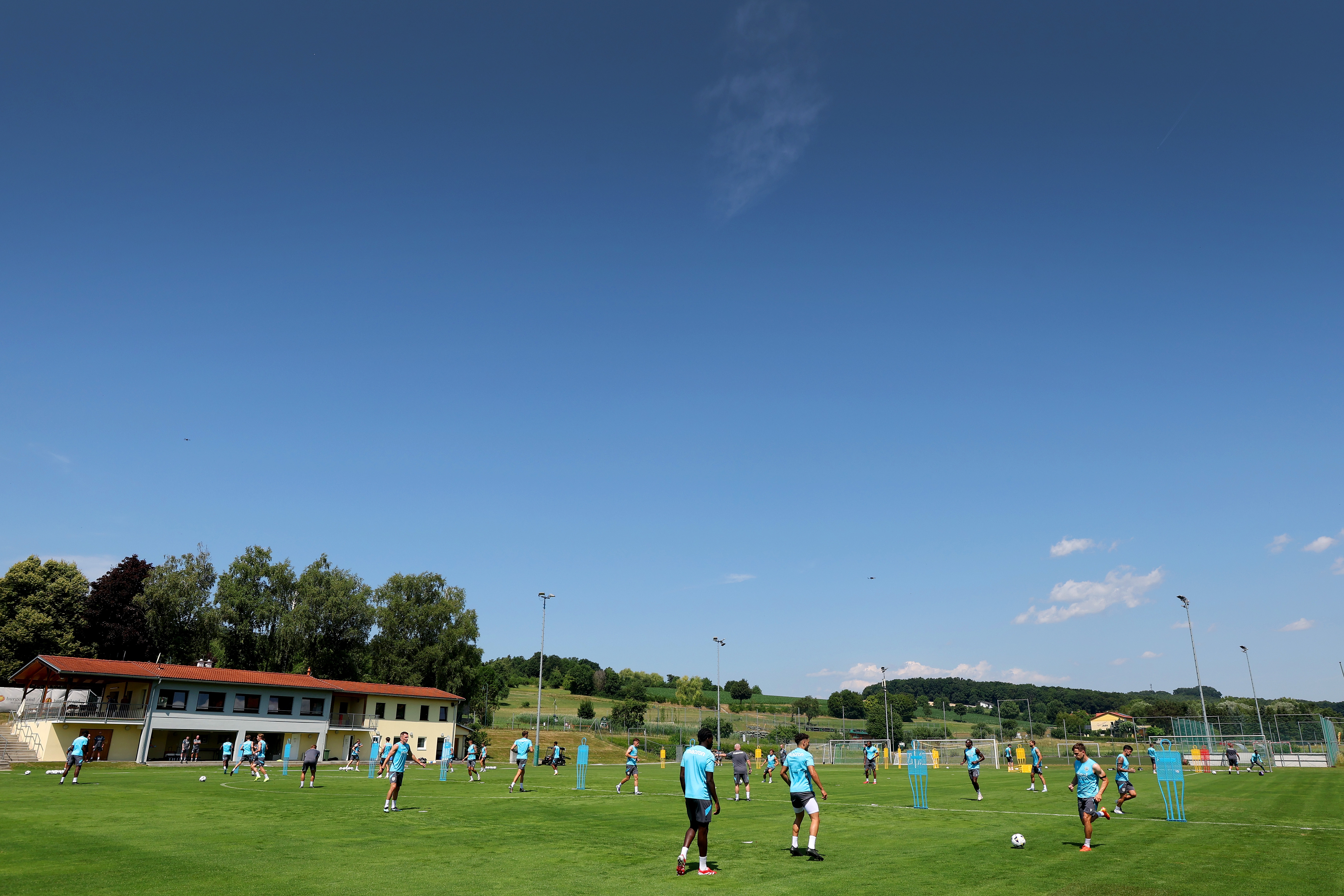 A general view of training and the surrounding area with blue skies above 